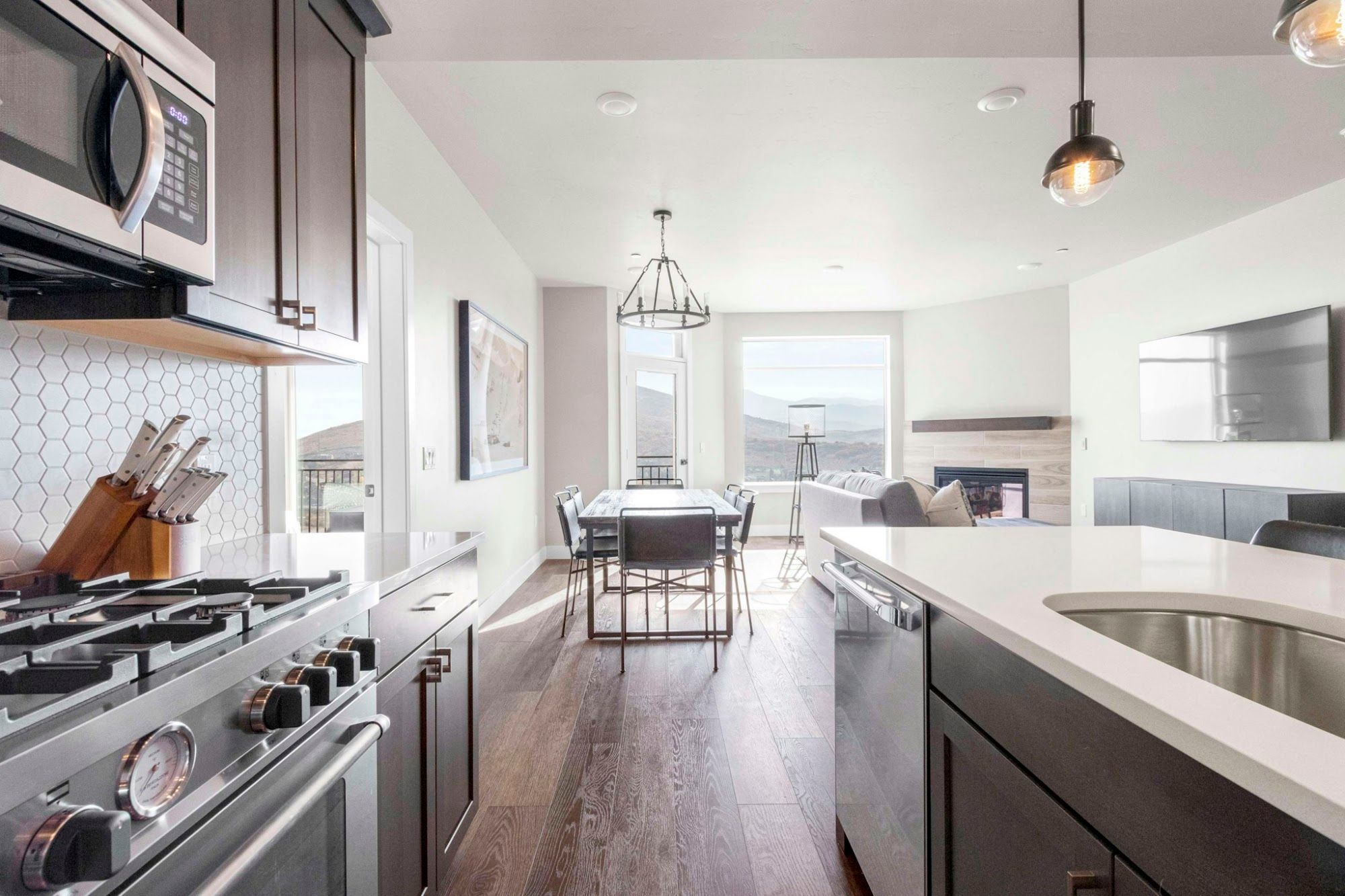 image Modern full kitchen with stainless appliances and mountain views