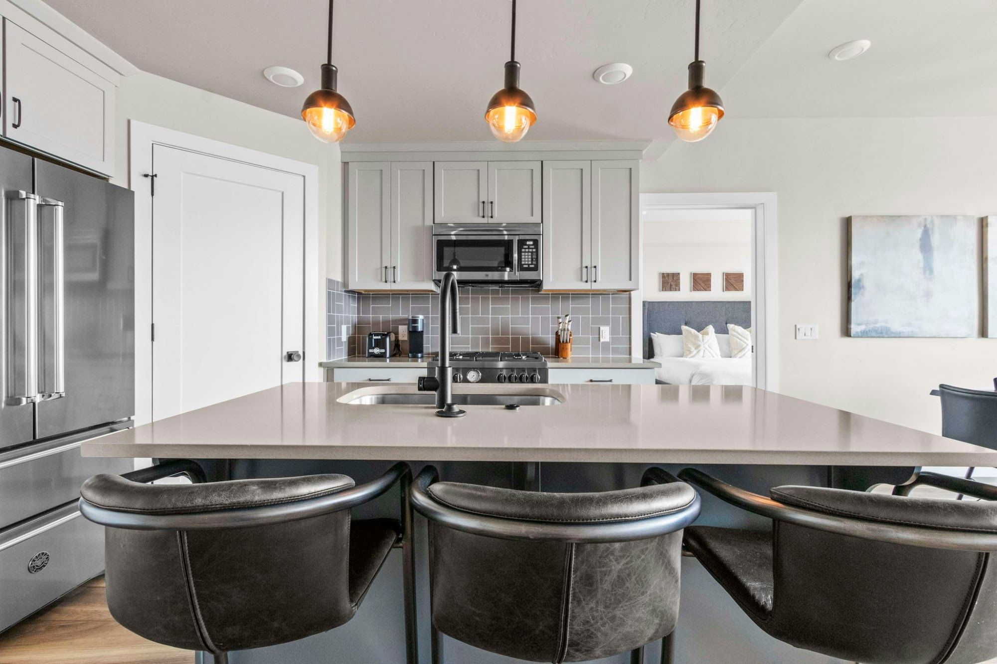image Open-plan kitchen with central island and bar-height seating