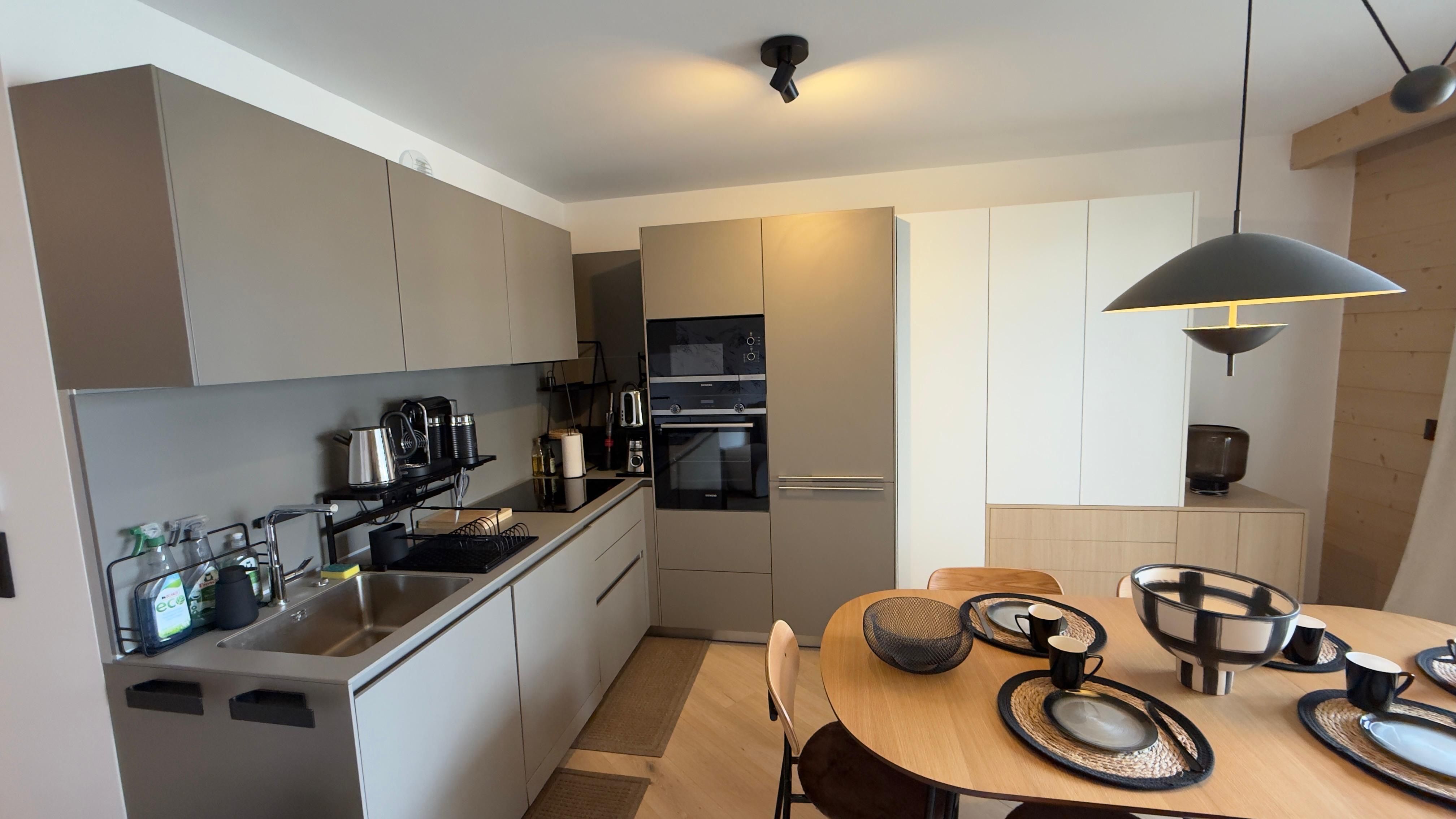 image Restaurants sit a short walk away, but this fully equipped kitchen with an oven, induction hob, and Nespresso machine works just as well