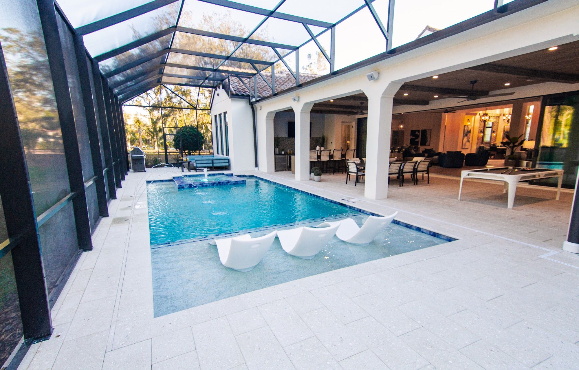 image Covered breezeway leading to screened pool area