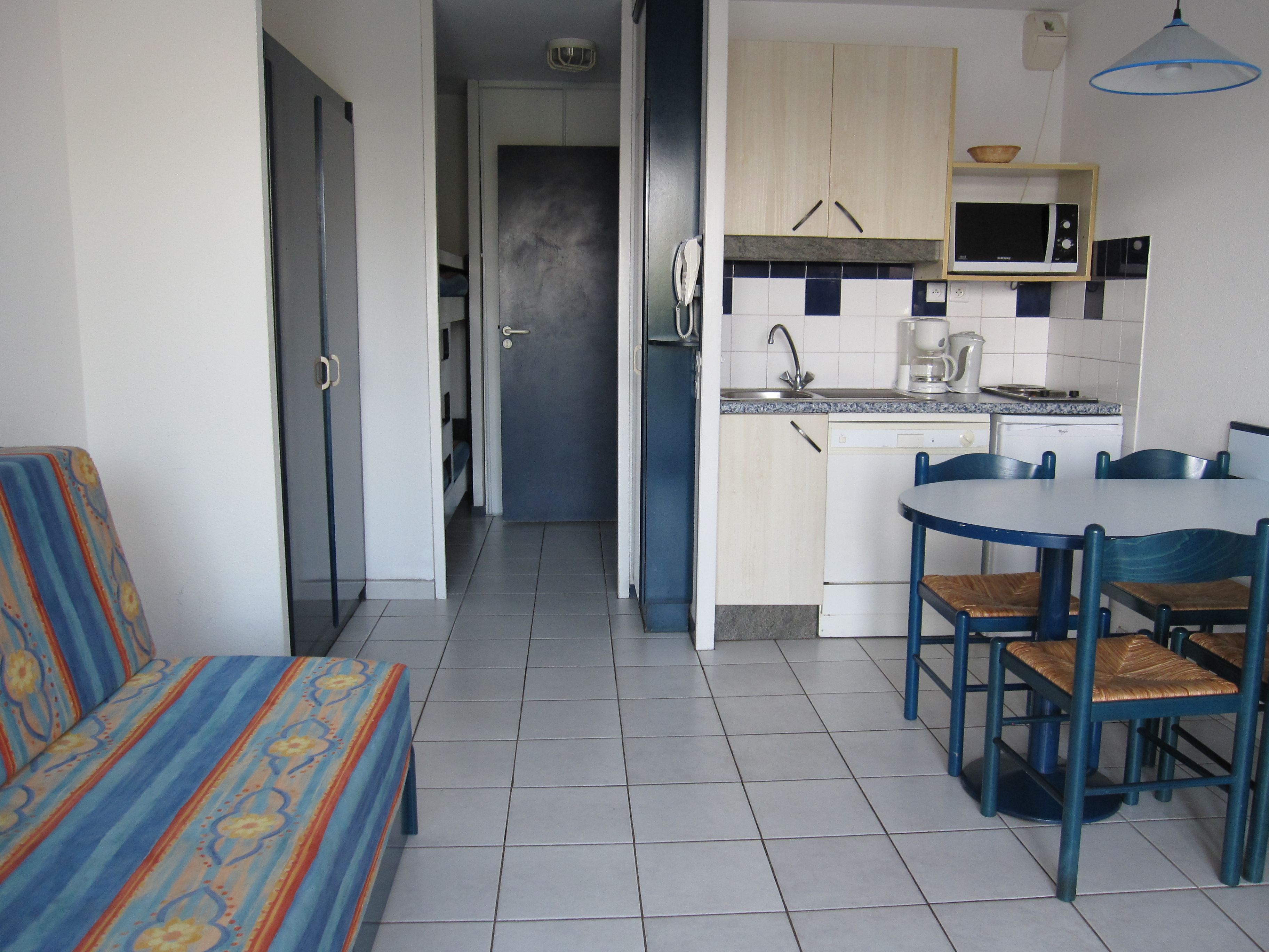 image Between pool days and rides along the Landes' cycling paths, settle into the living area with the TV within reach.