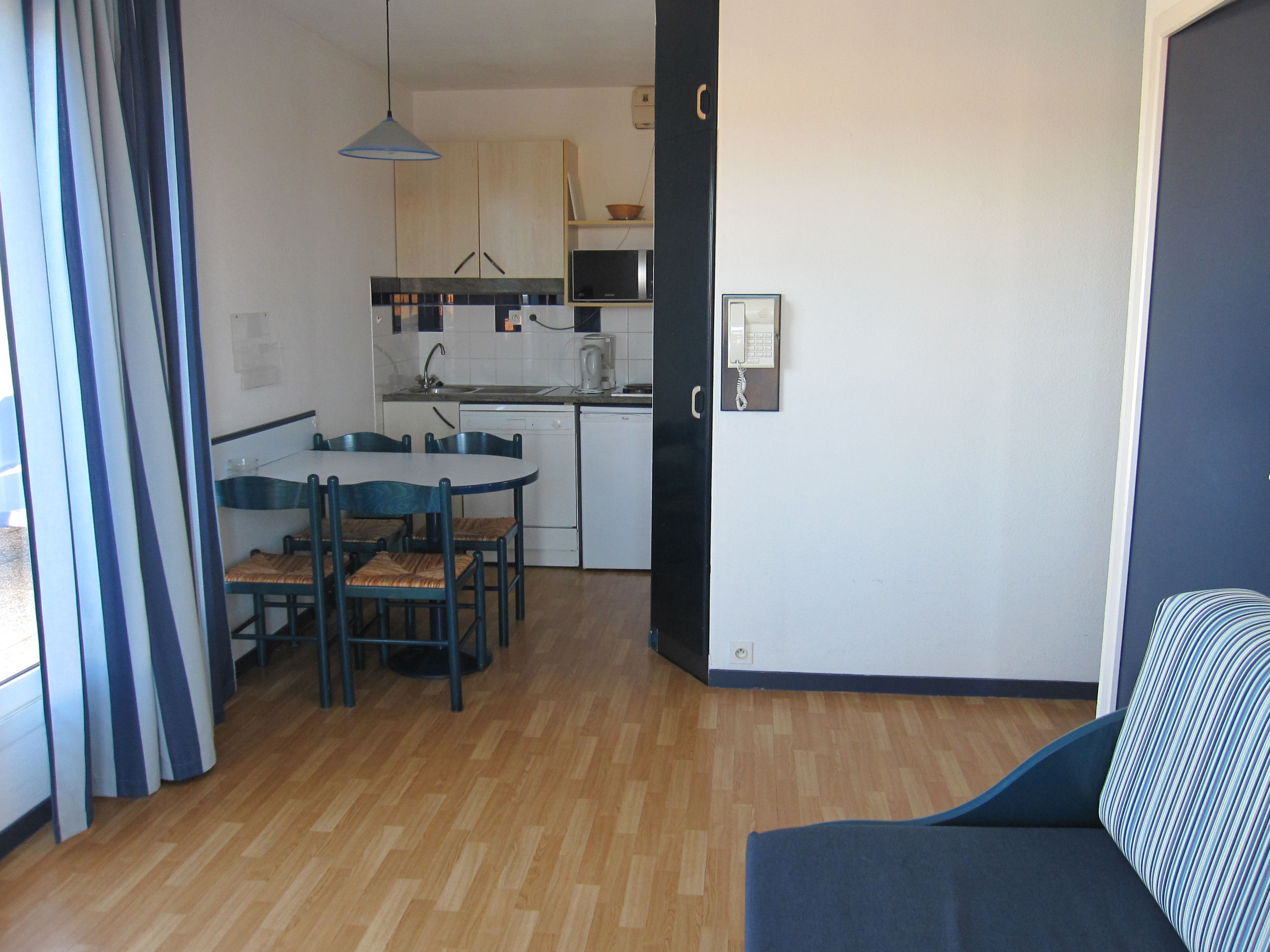 image Cook up something simple in the kitchenette, then serve it up right at the dining table just steps away.