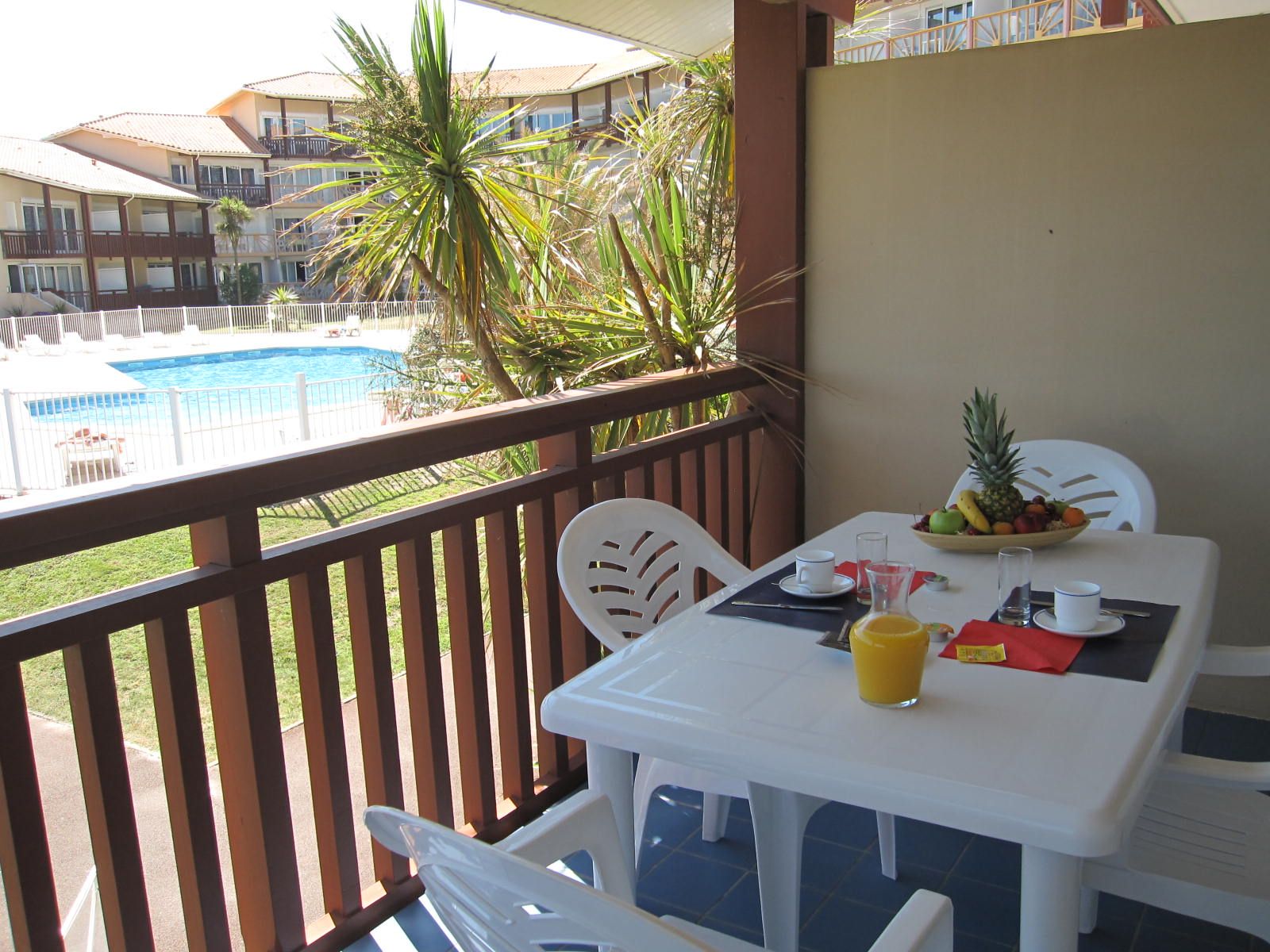 image With the lake beach just steps away, this terrace makes an easy spot for coffee and fresh fruit each morning.