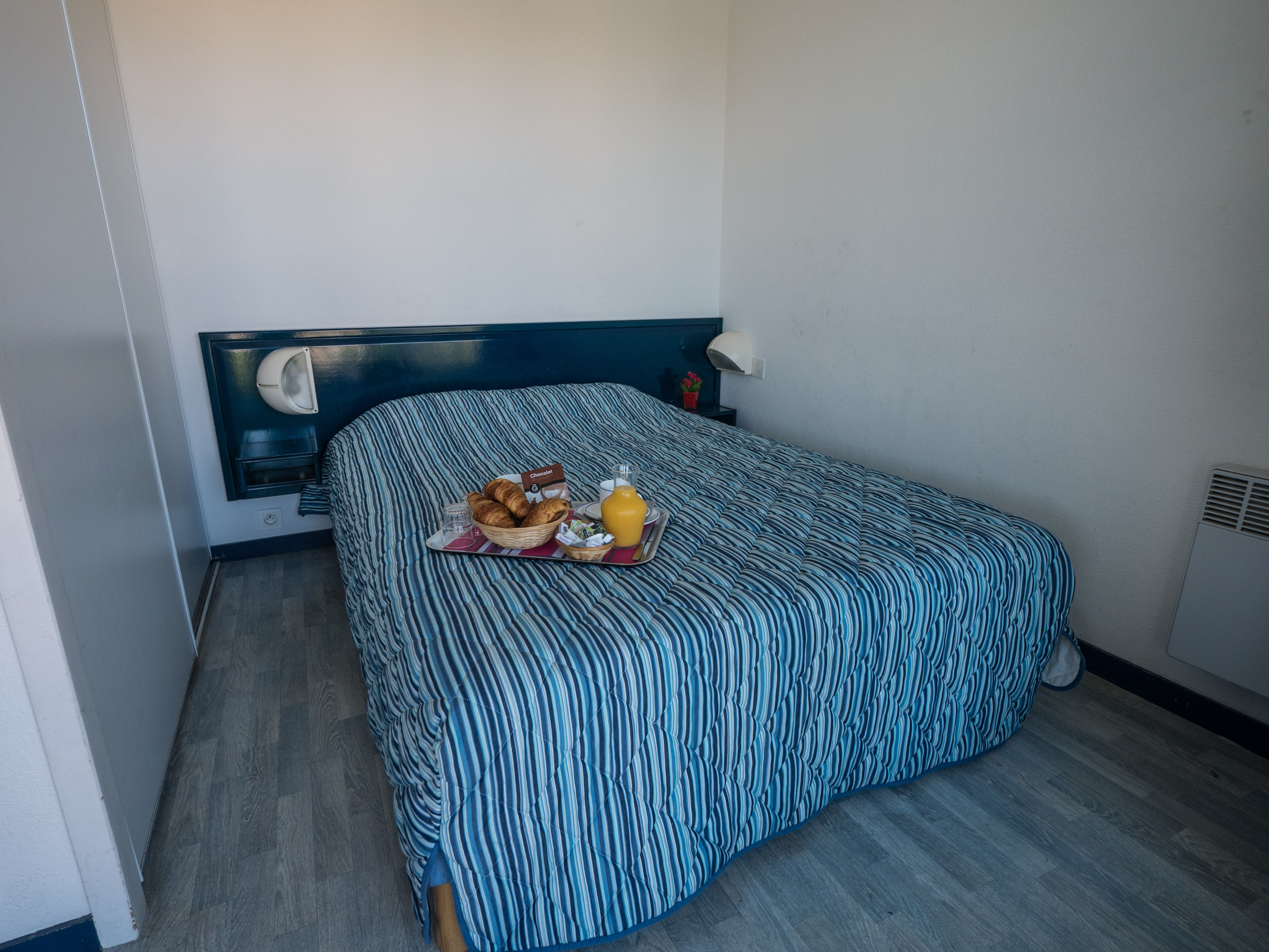 image Start the morning with fresh bread in bed before a day of cycling and beach time nearby.