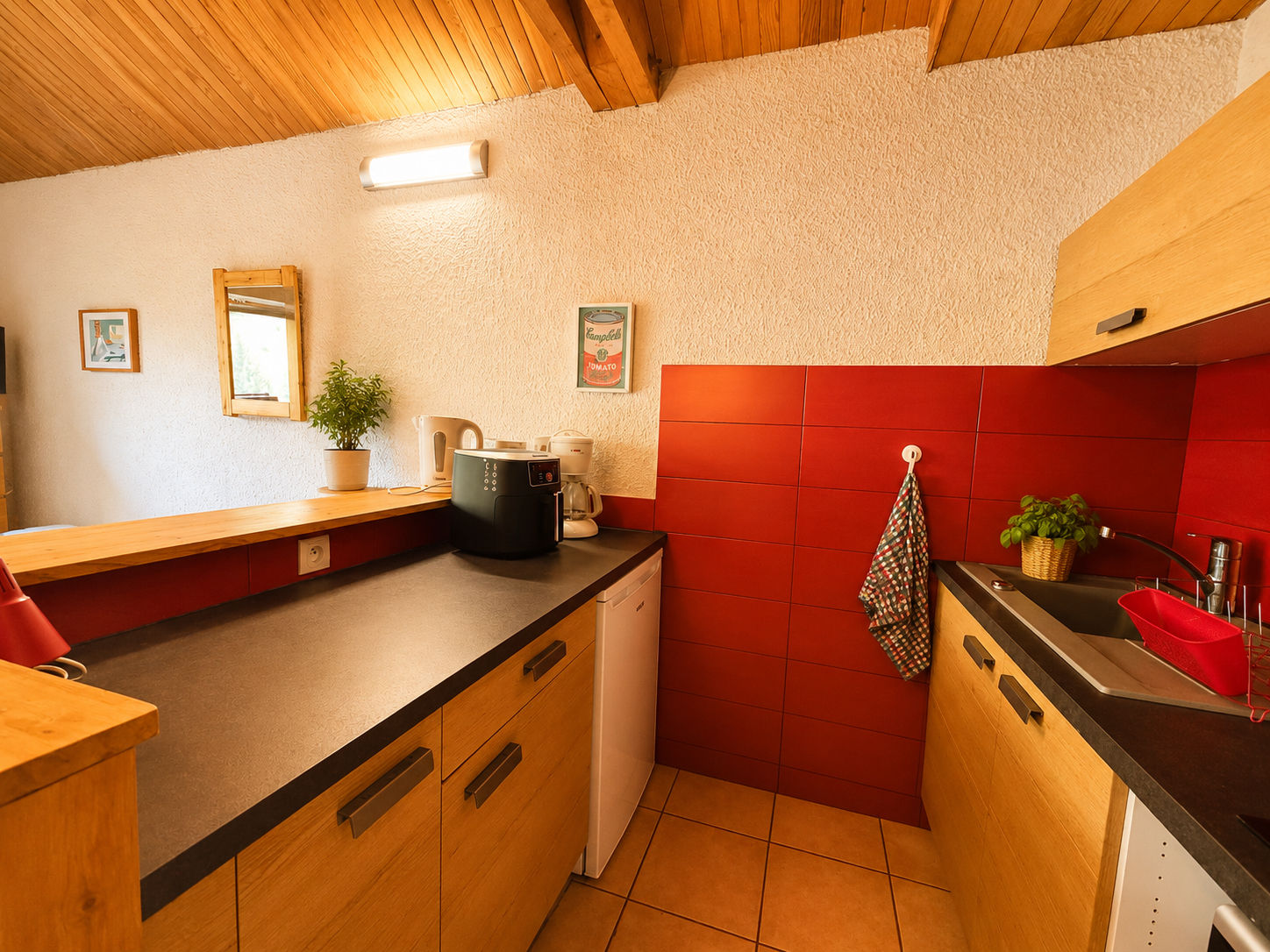image Whip up dinner using the stovetop, microwave, and air fryer tucked into the kitchenette.