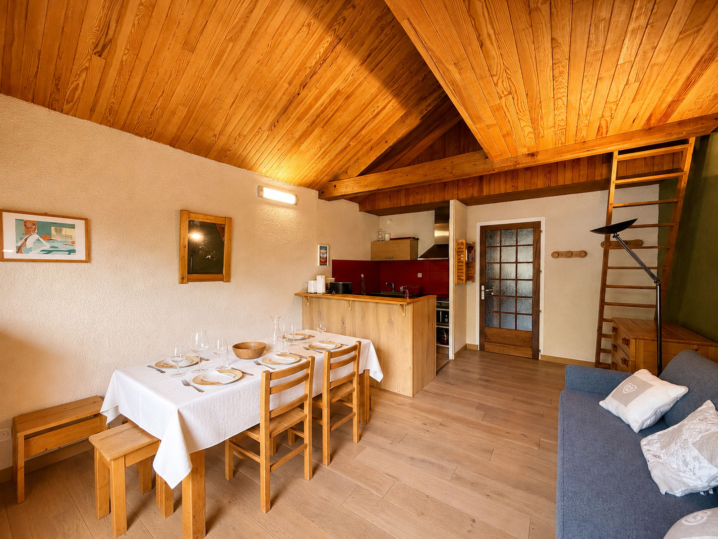 image Cook up a meal in the open-plan kitchen and gather around the dining table to enjoy it.