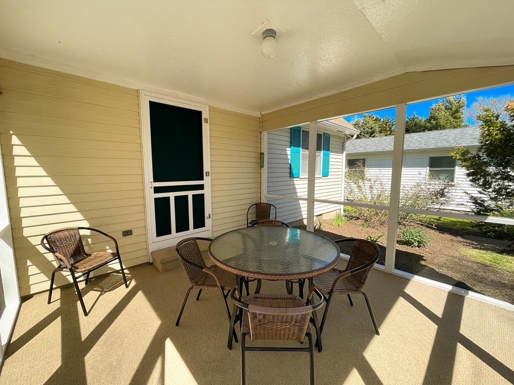 image Cozy outdoor dining area with lovely sunlight
