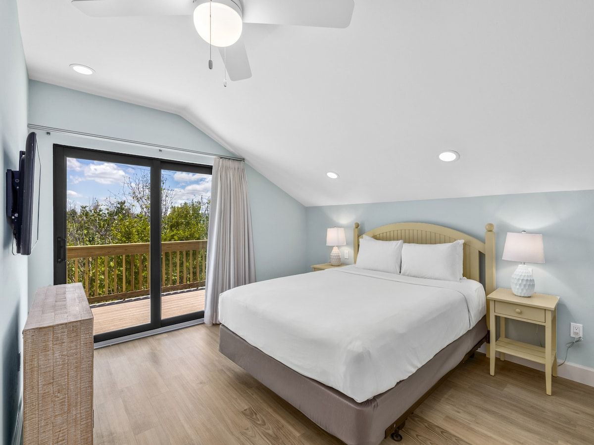 image A bedroom offers a quiet place to rest after a day outdoors.