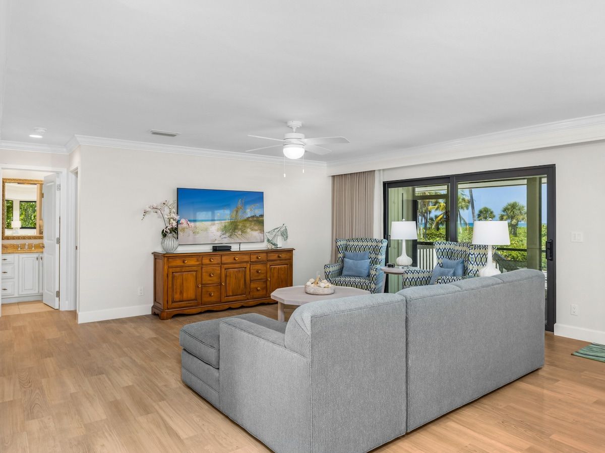 image Sit back in the living area, furnished for everyday downtime.