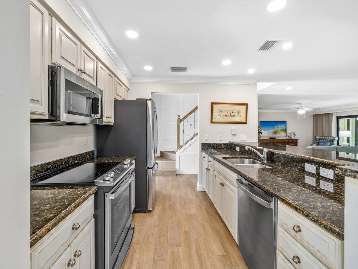 image The kitchen comes fitted with everything needed to cook a full meal.