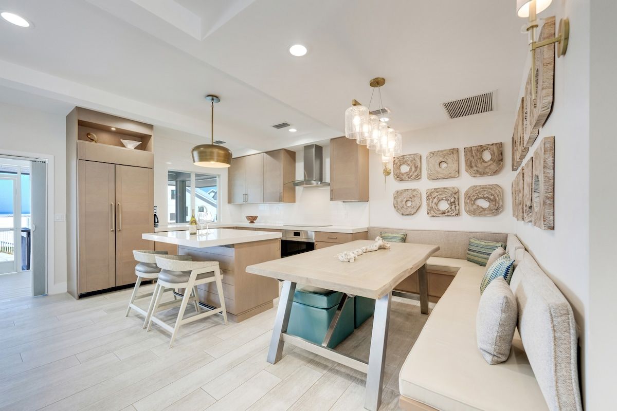 image The dining area opens onto the kitchen for easy meals.