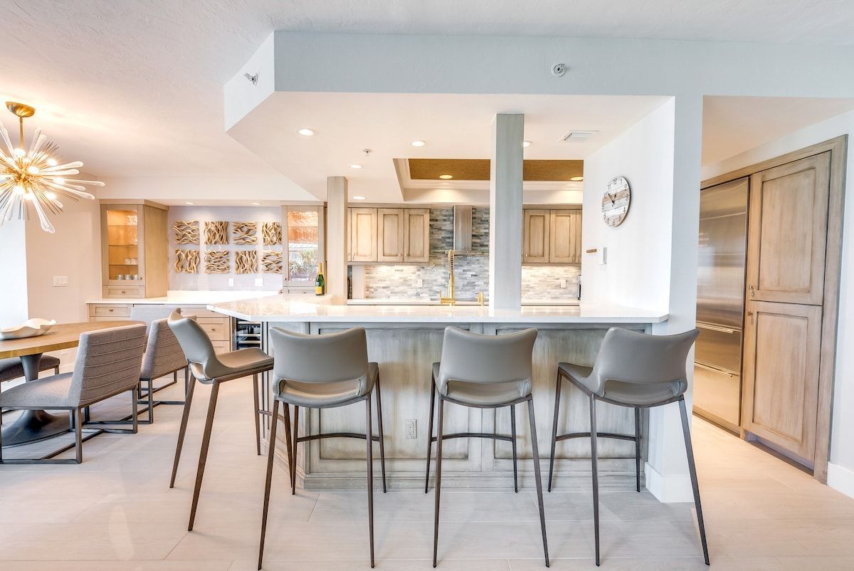 image A dining space opens onto the kitchen for easy meals together.
