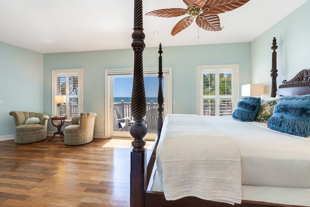 image A bedroom opens onto its own private porch.