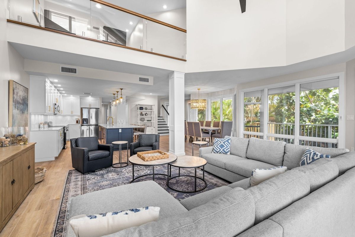 image Dining and living areas share one open space for gathering.