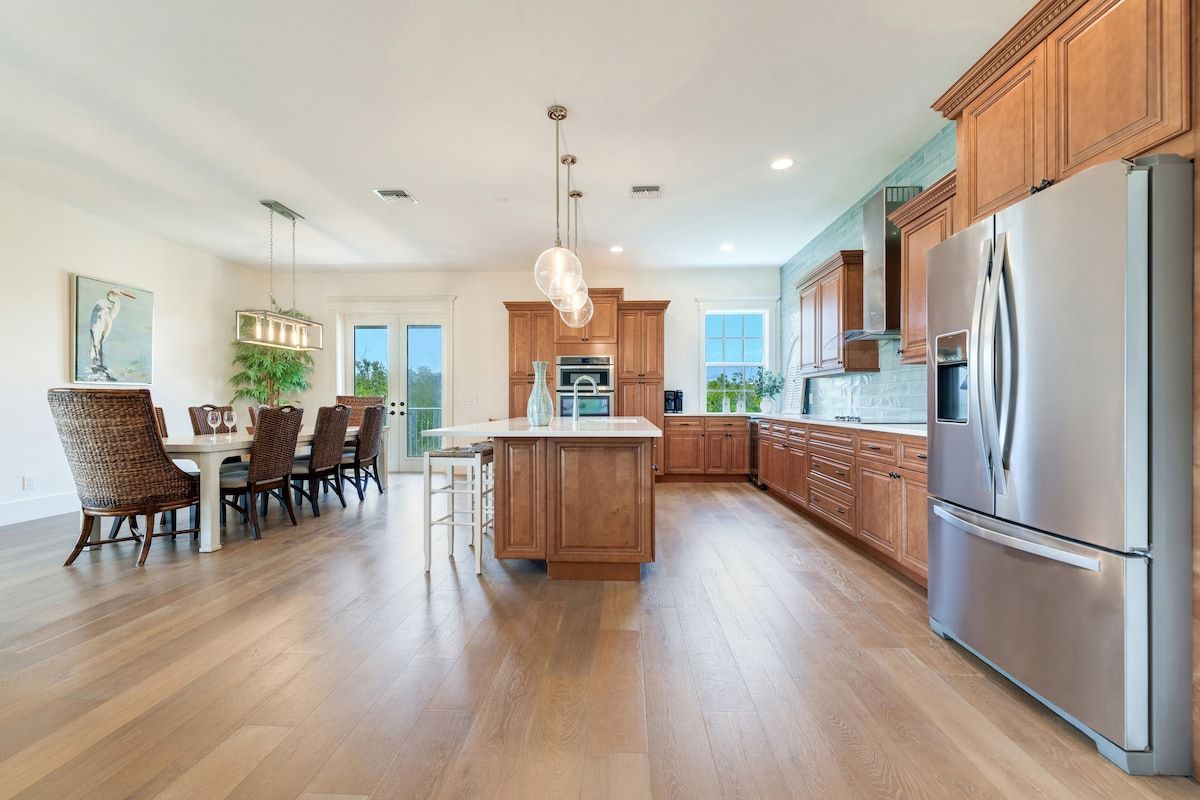 image The dining area opens onto the kitchen for easy meals.
