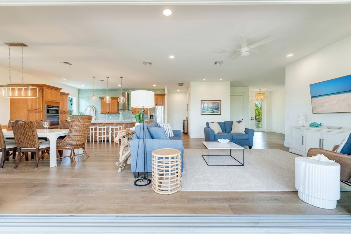 image Dining and living areas share one open space for gathering.
