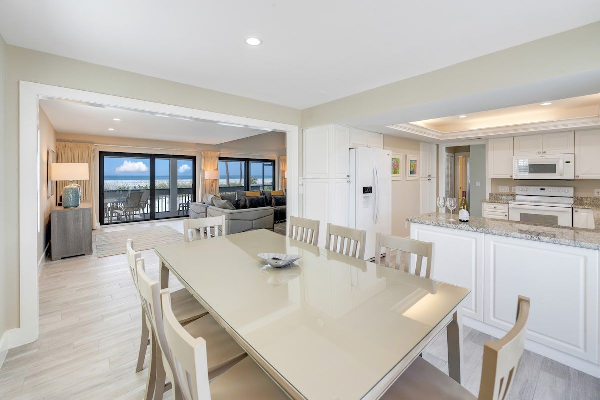 image Dining and living areas share one open space for gathering.