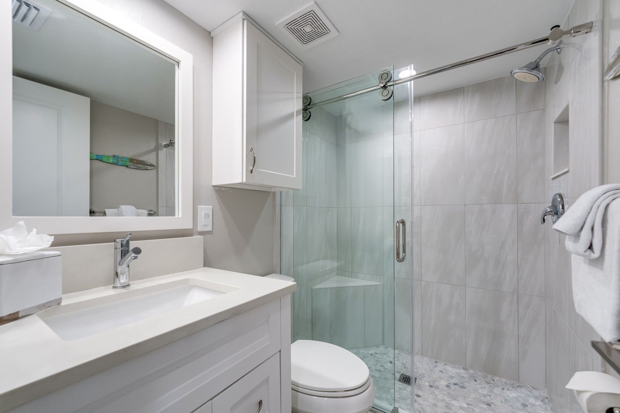 image Clean bathroom with tiled shower and modern fixtures