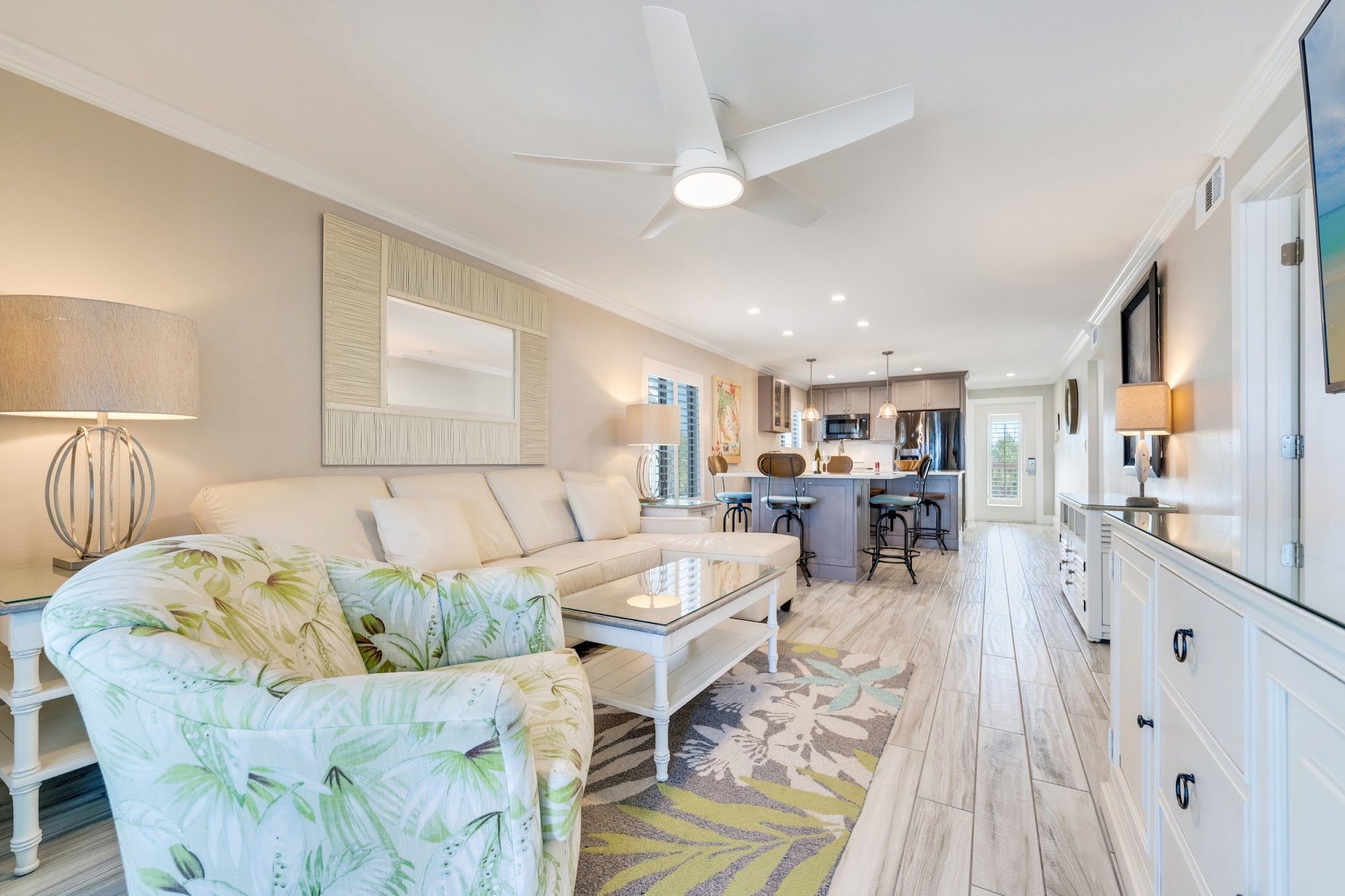image Open living room with comfortable seating and beach décor