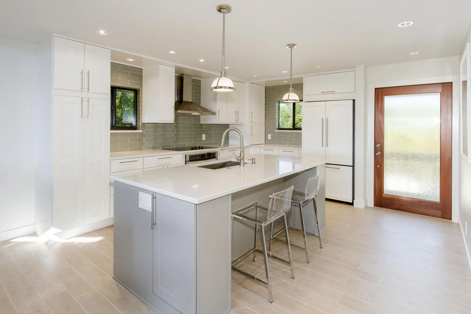image Modern kitchen with island seating and updated appliances
