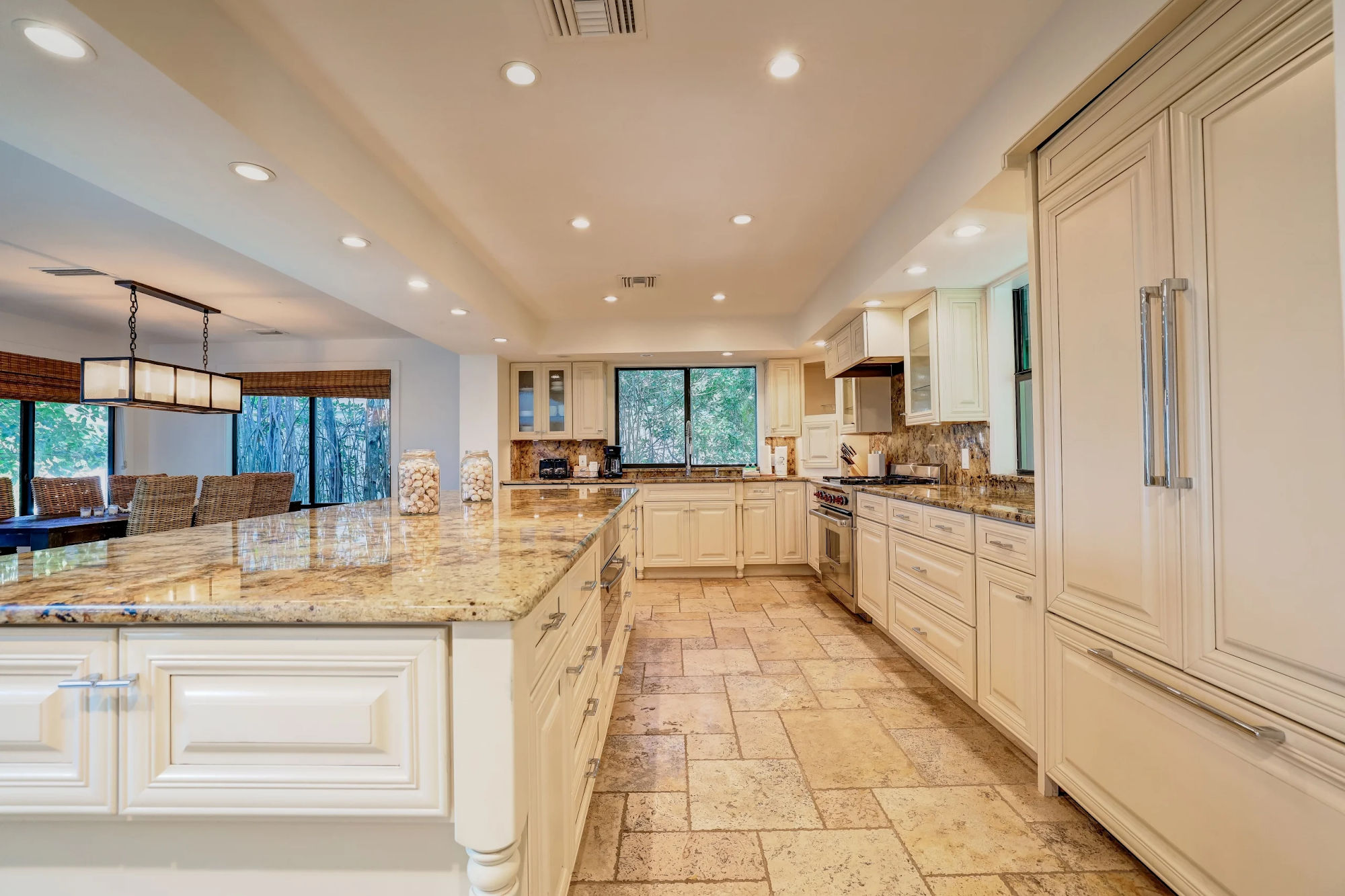 image Fully equipped kitchen with ample counter space and cabinetry