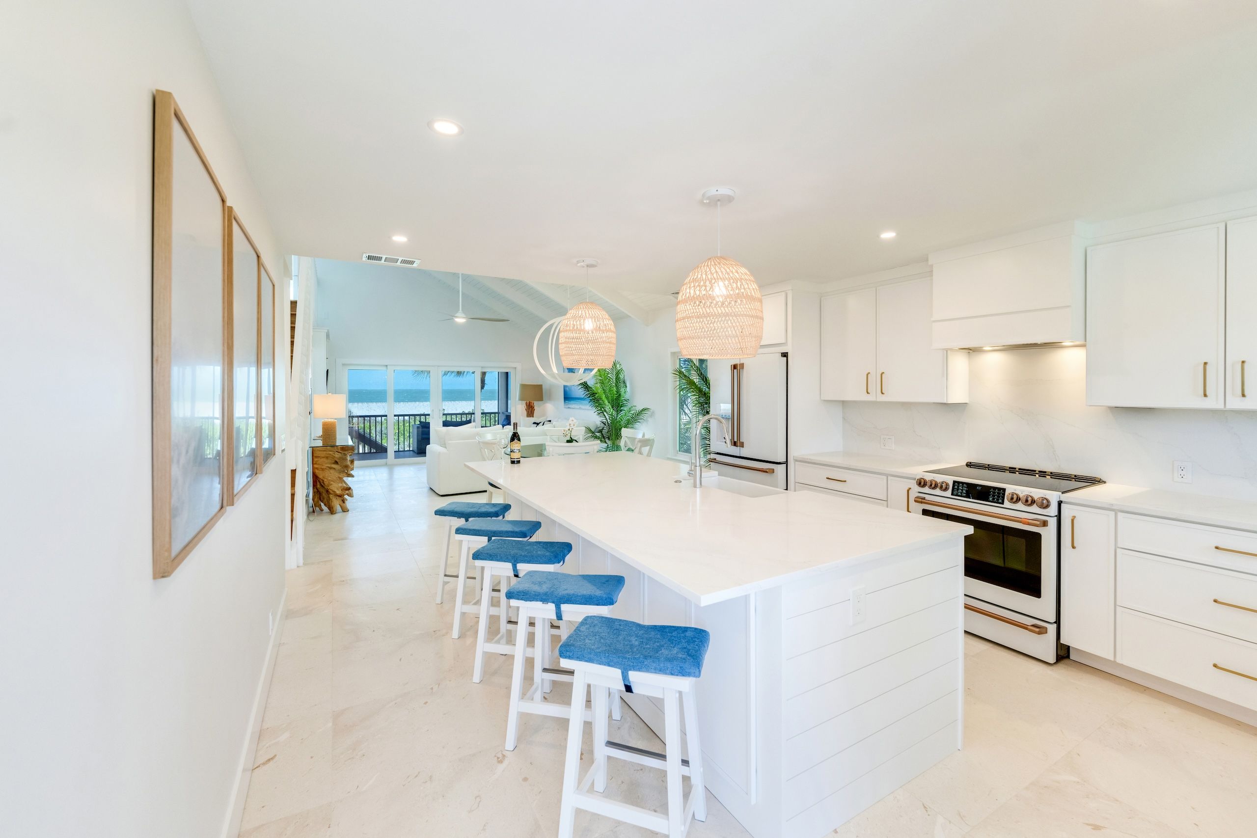 image A gourmet kitchen boasts a spacious island, complemented by stylish lighting and modern appliances.