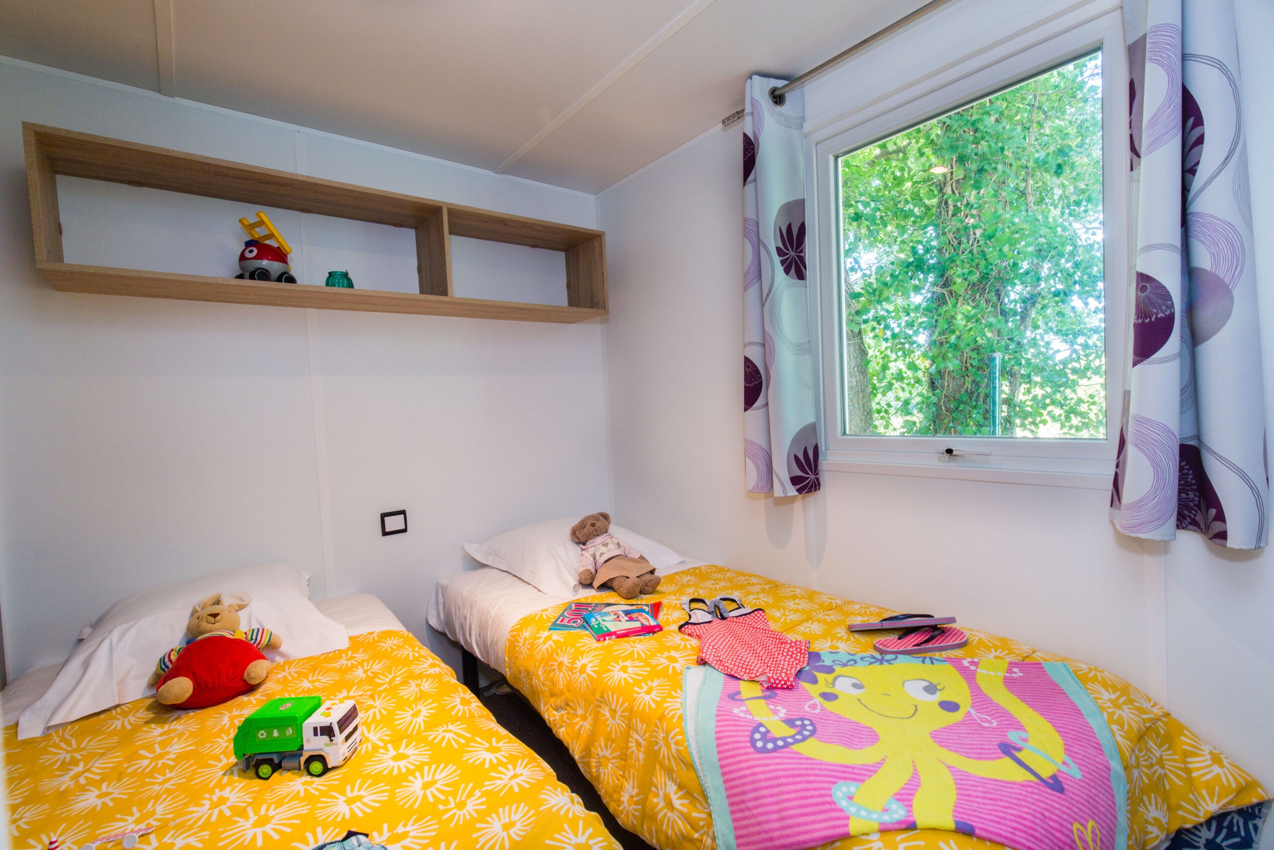 image The twin bedroom, bright and cheerful for younger guests.