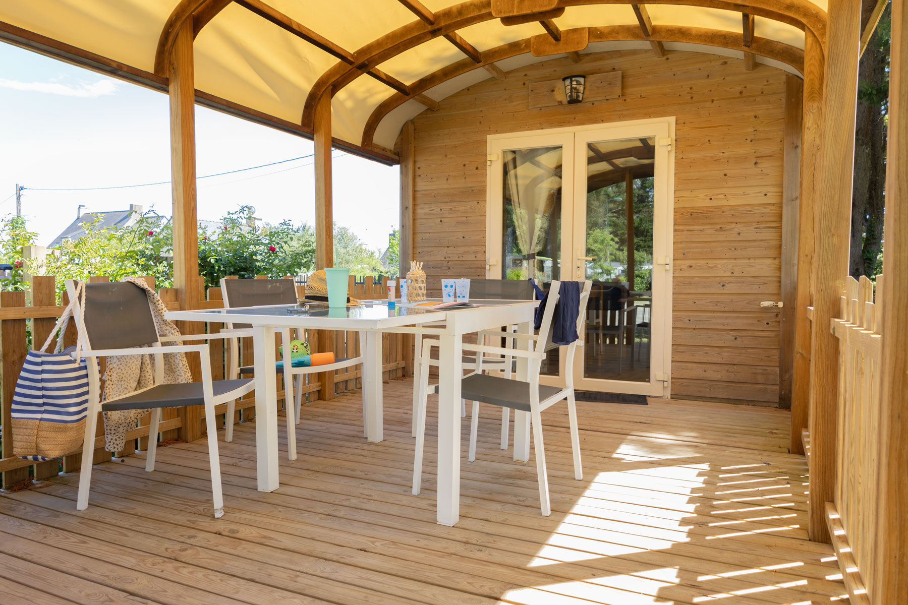 image The porch, set for outdoor dining.