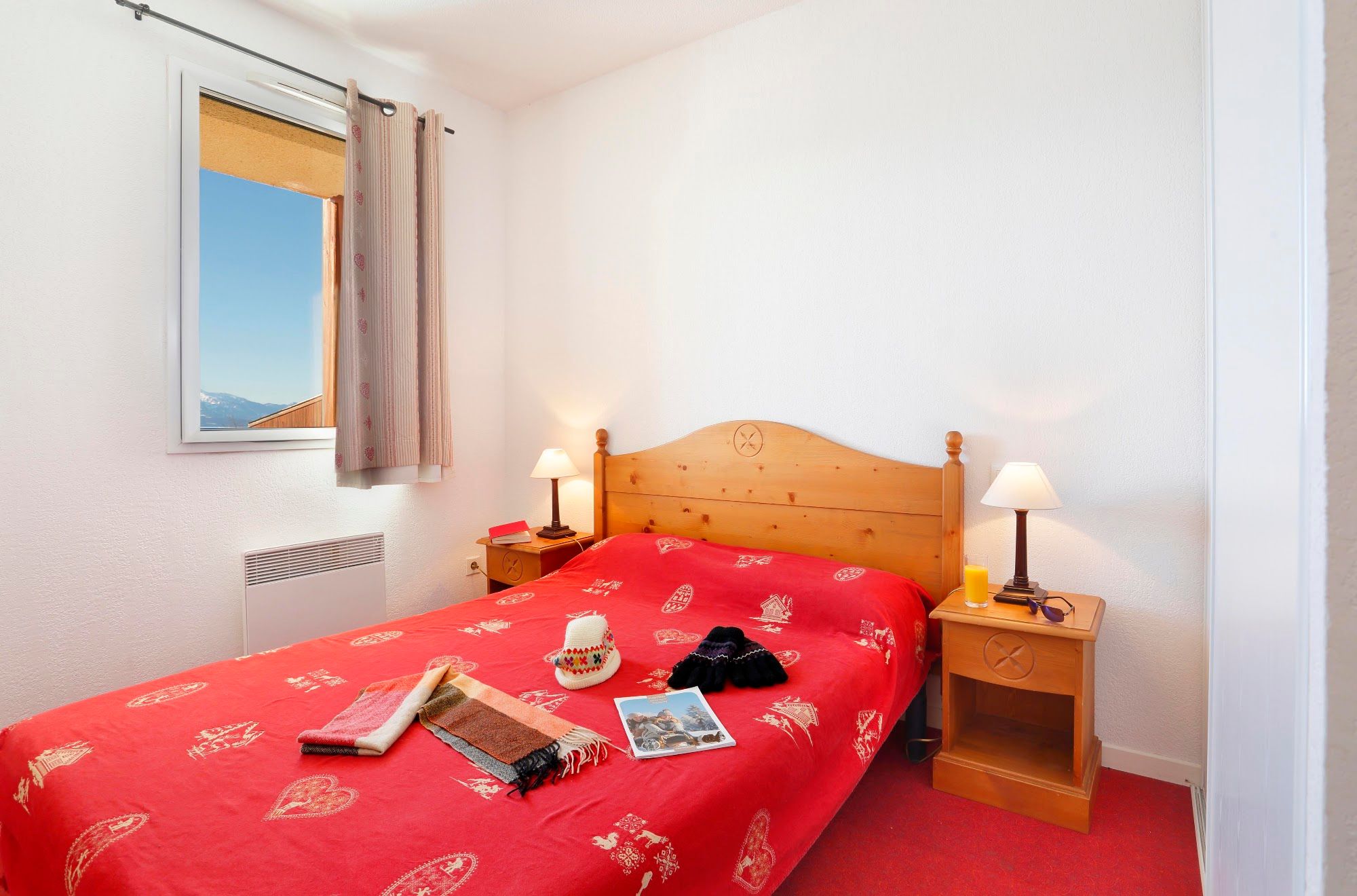 image Bedroom with double bed, pine headboard and two bedside tables