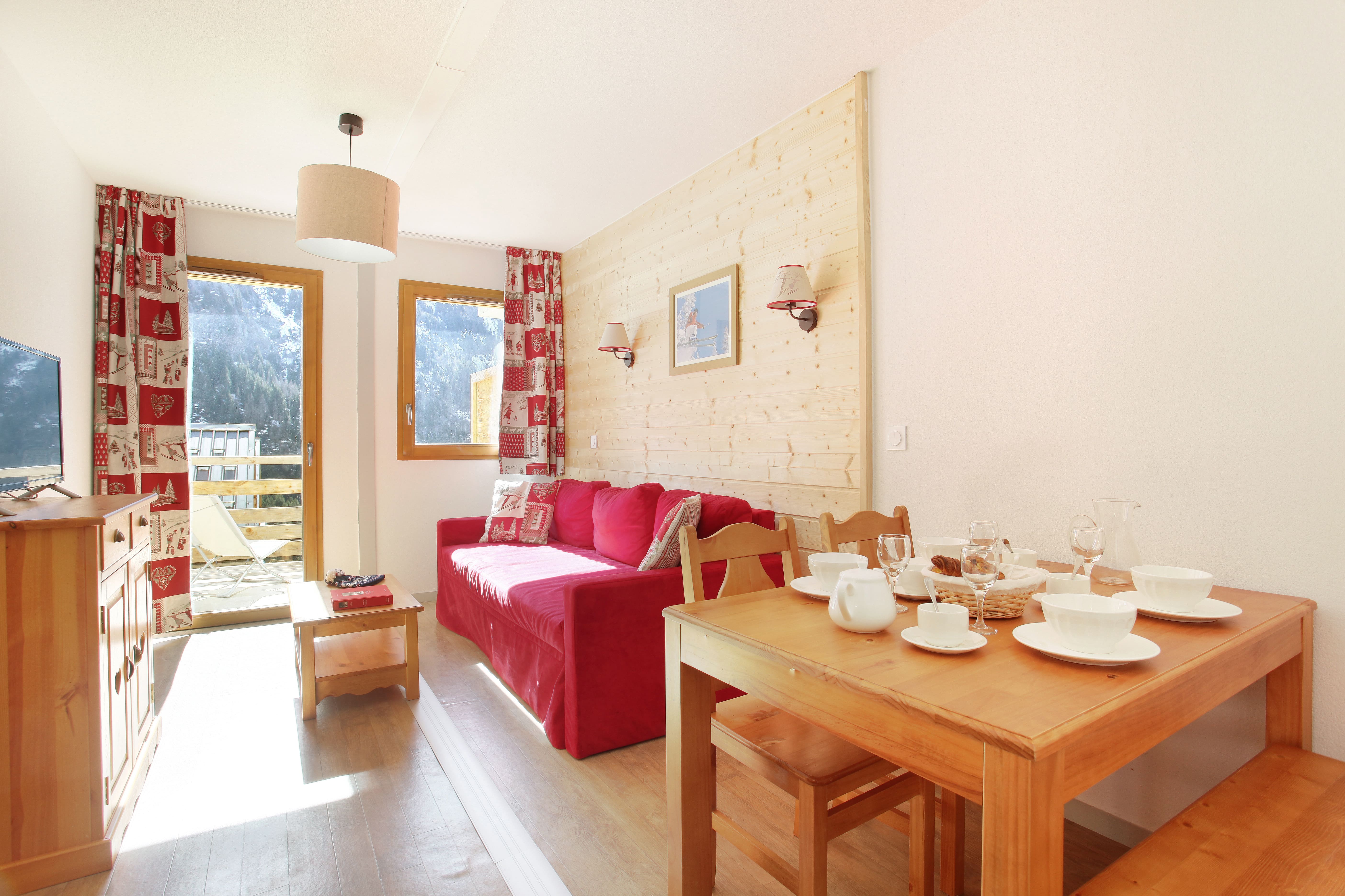 image Share meals at the dining table after skiing the linked pistes of Alpe d'Huez