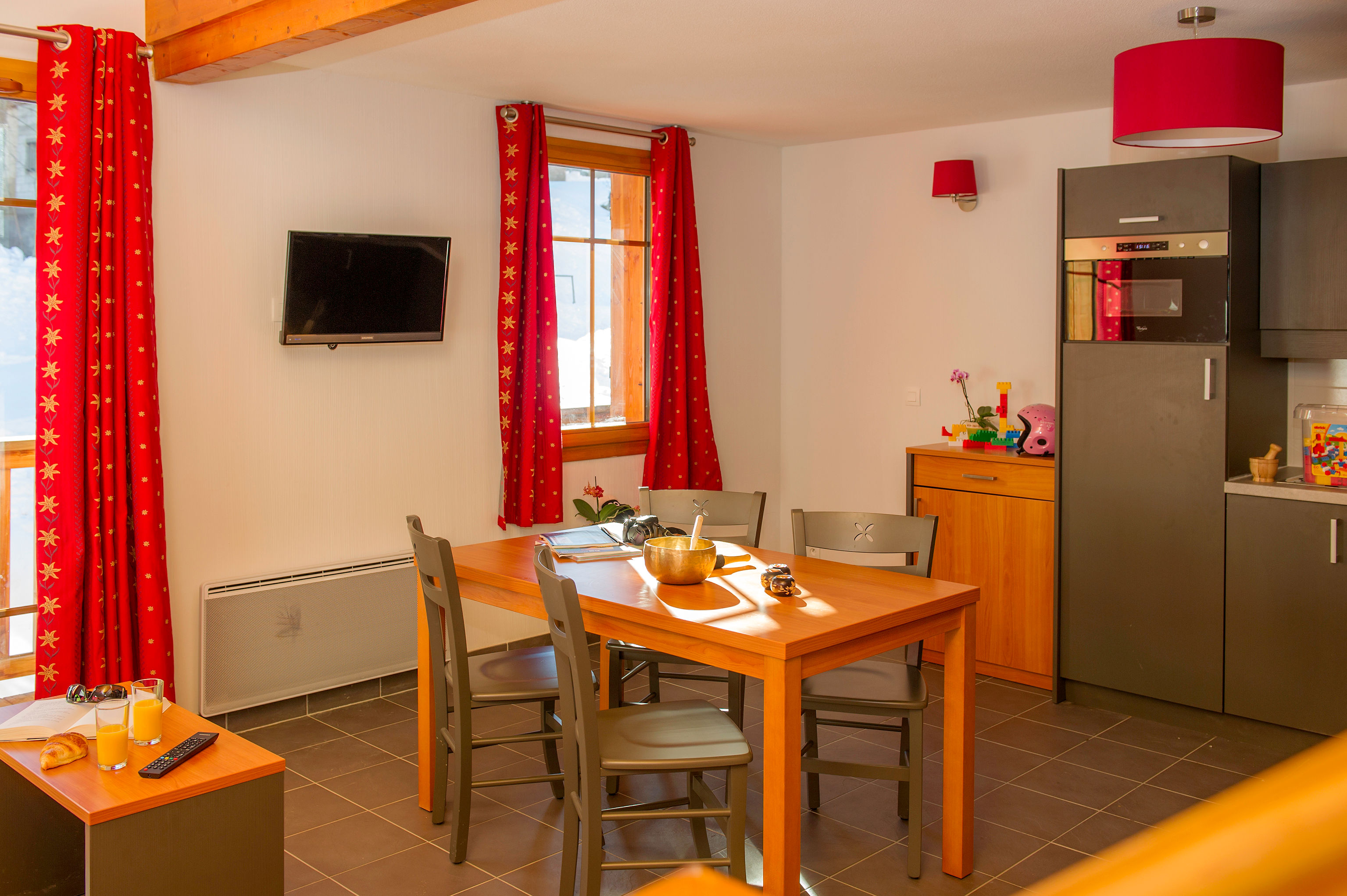 image Natural light fills the kitchen and dining corner.