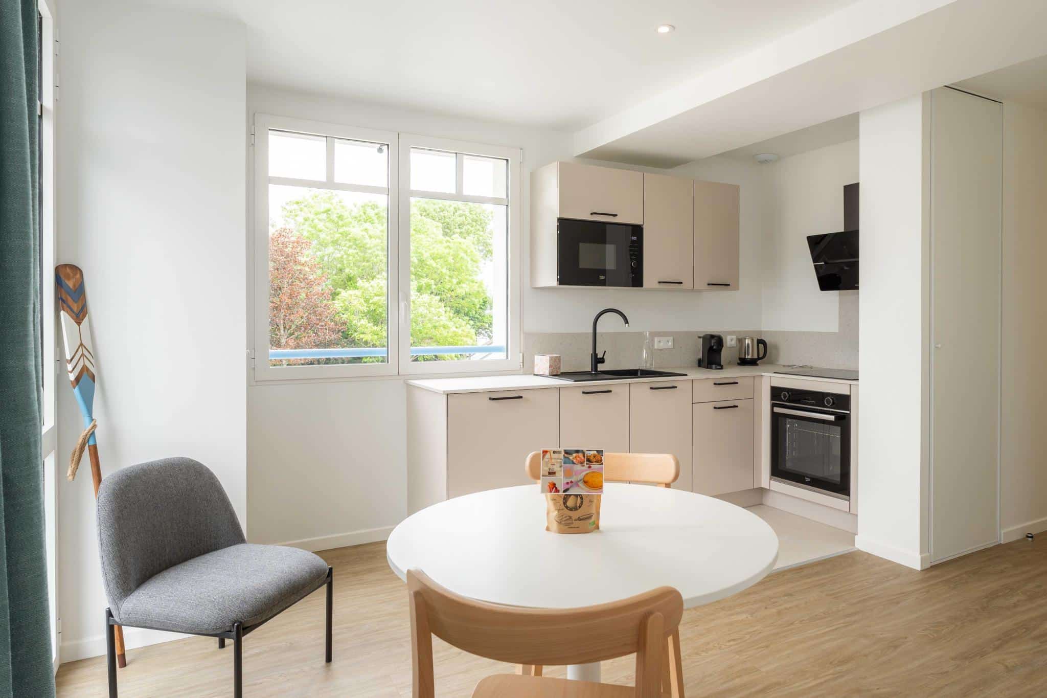 image The dining corner, bright with natural light.