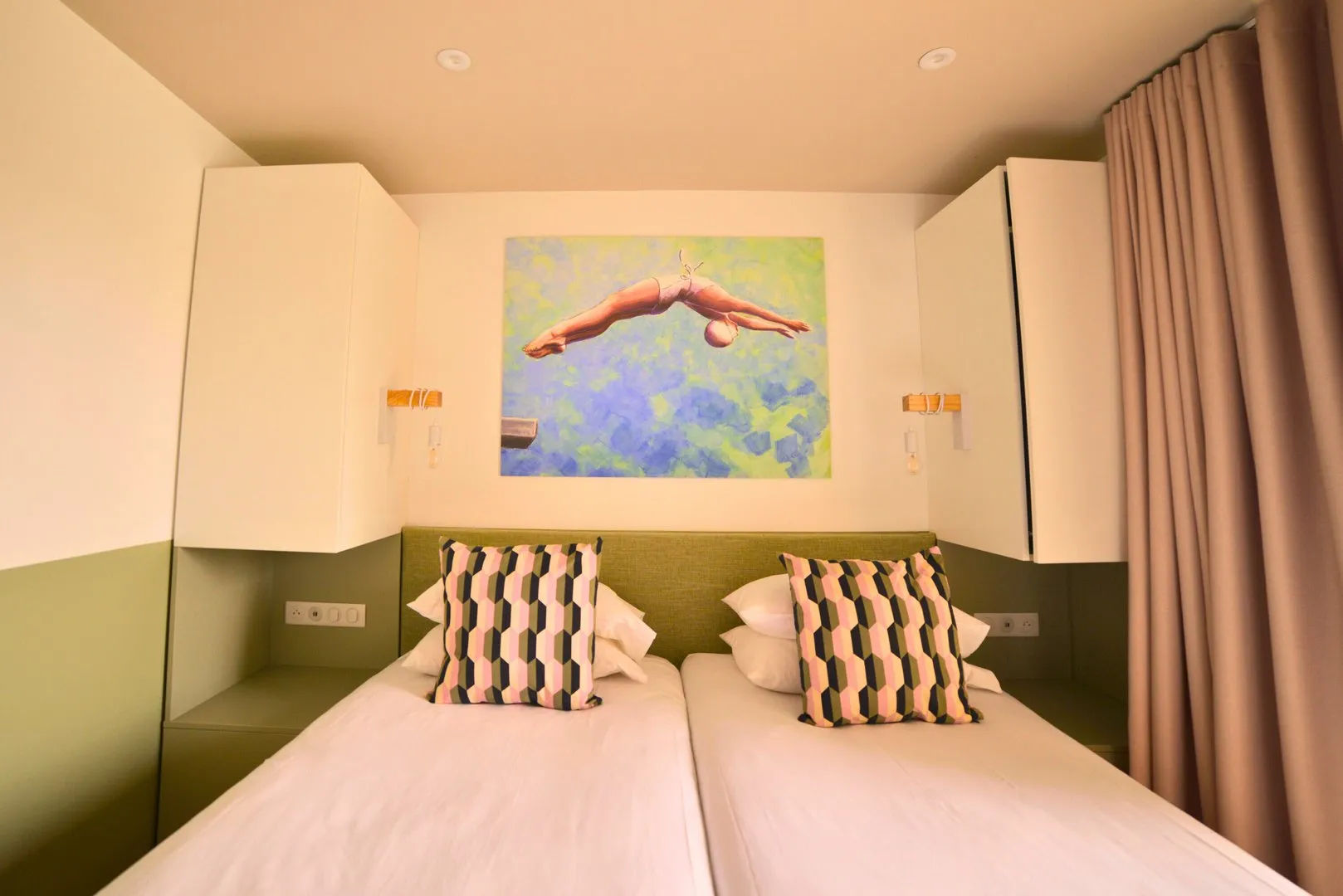 image Bedroom with two beds and decorative painting.