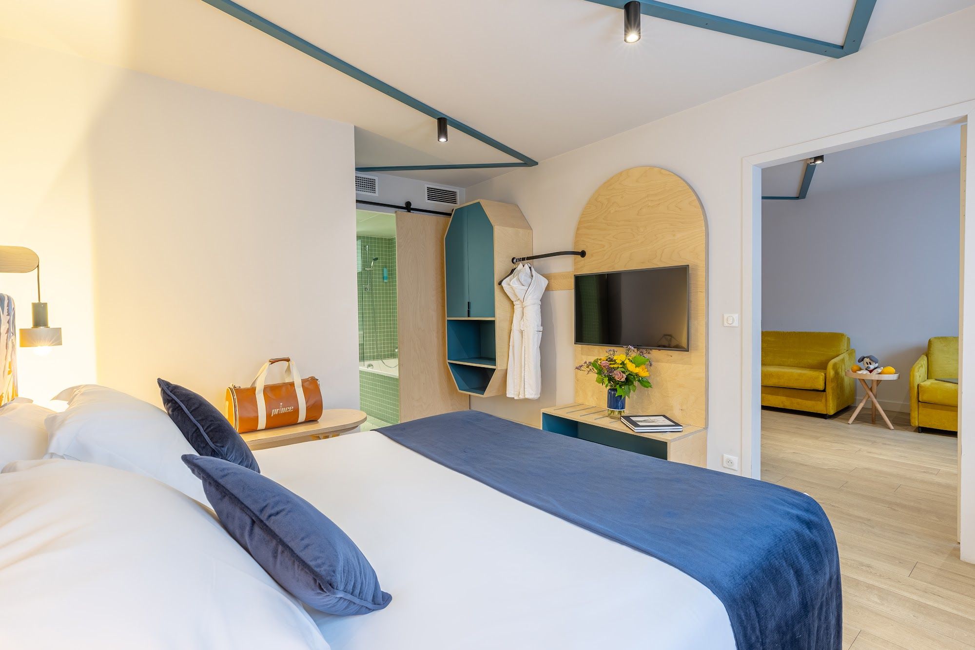 image Suite bedroom with a double bed and open bathroom