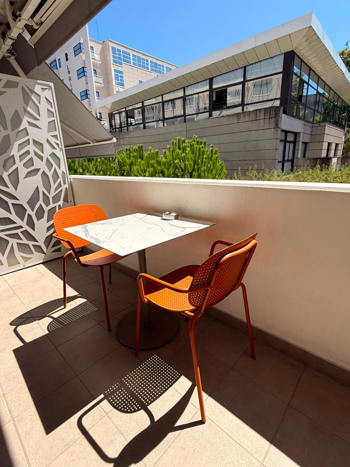 image Balcony with two chairs and a table