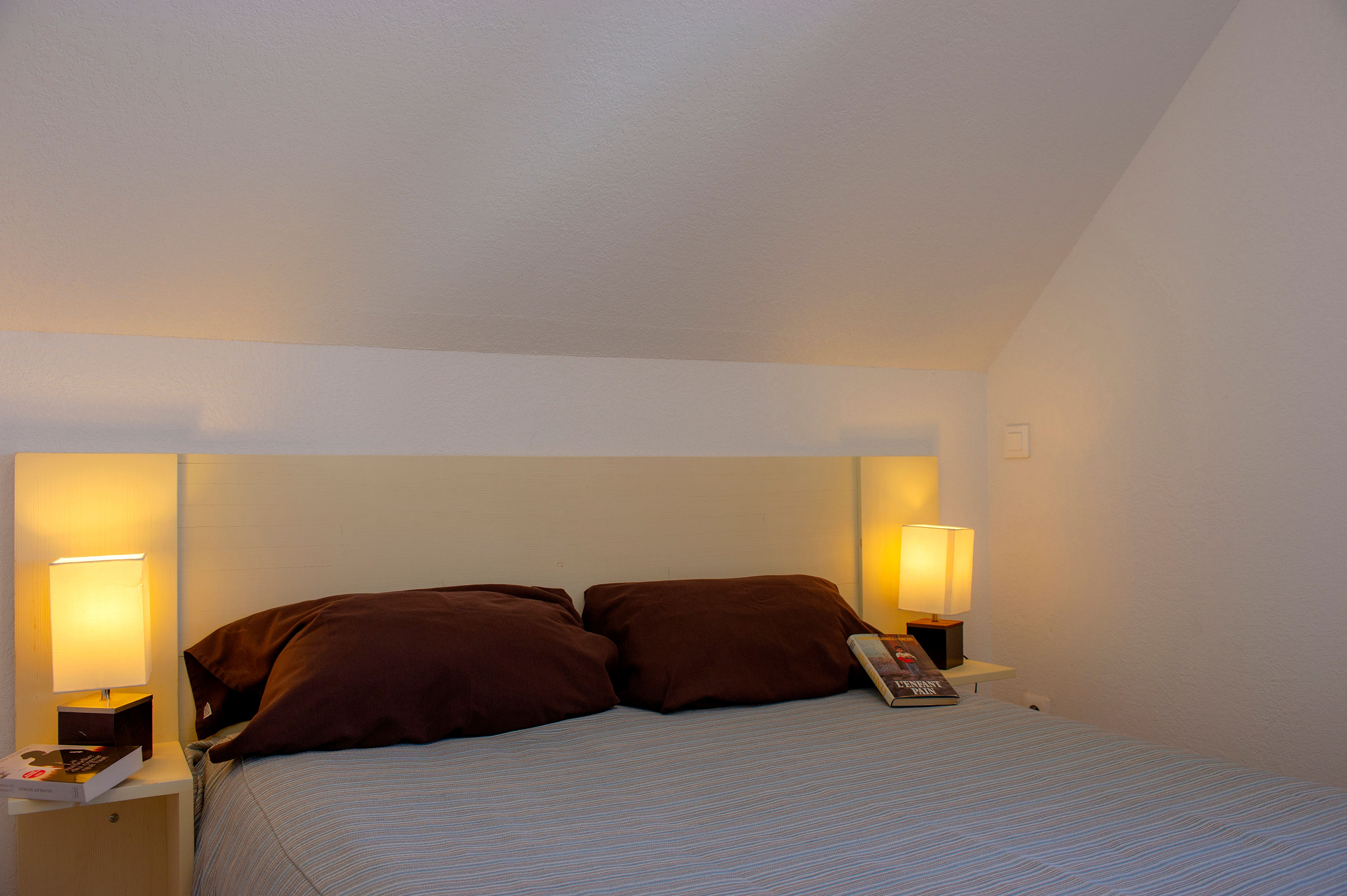 image The ground-floor bedroom's double bed sits ready for arrival.