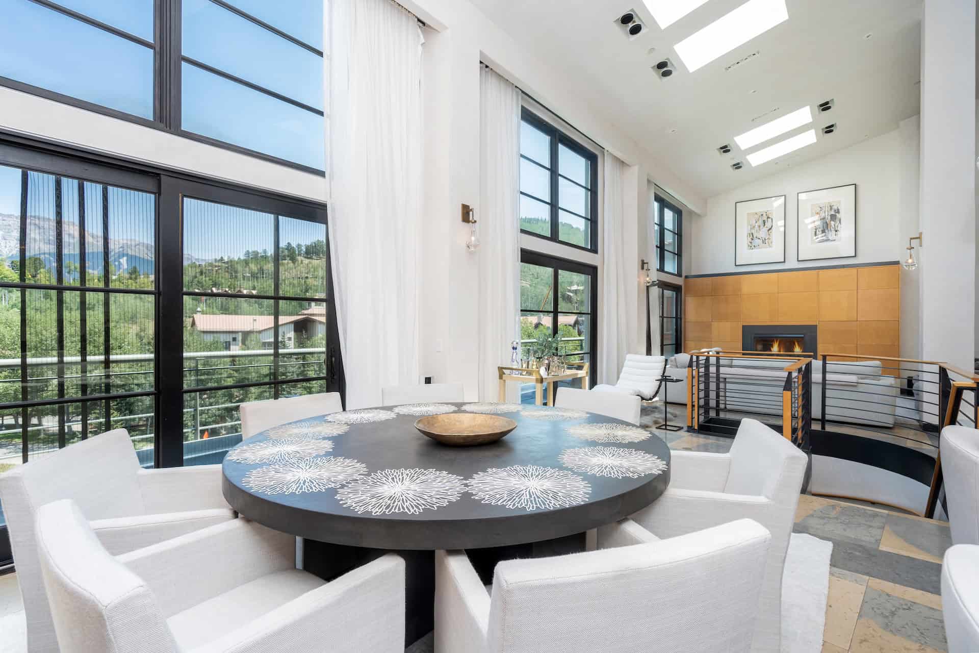 image Bright living space with large windows and modern furniture