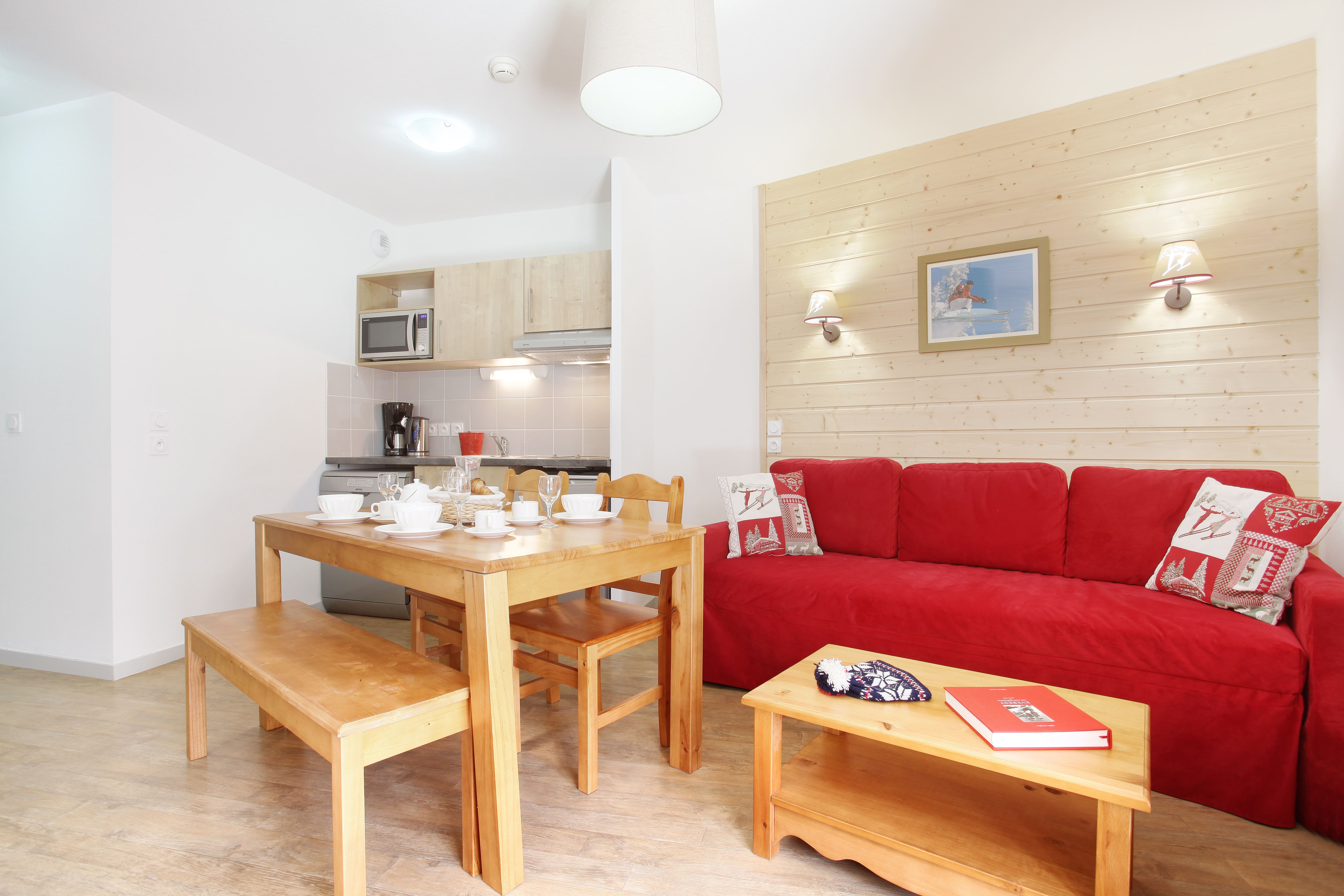 image The kitchenette comes with a ceramic hob, dishwasher, and Nespresso machine for easy meals