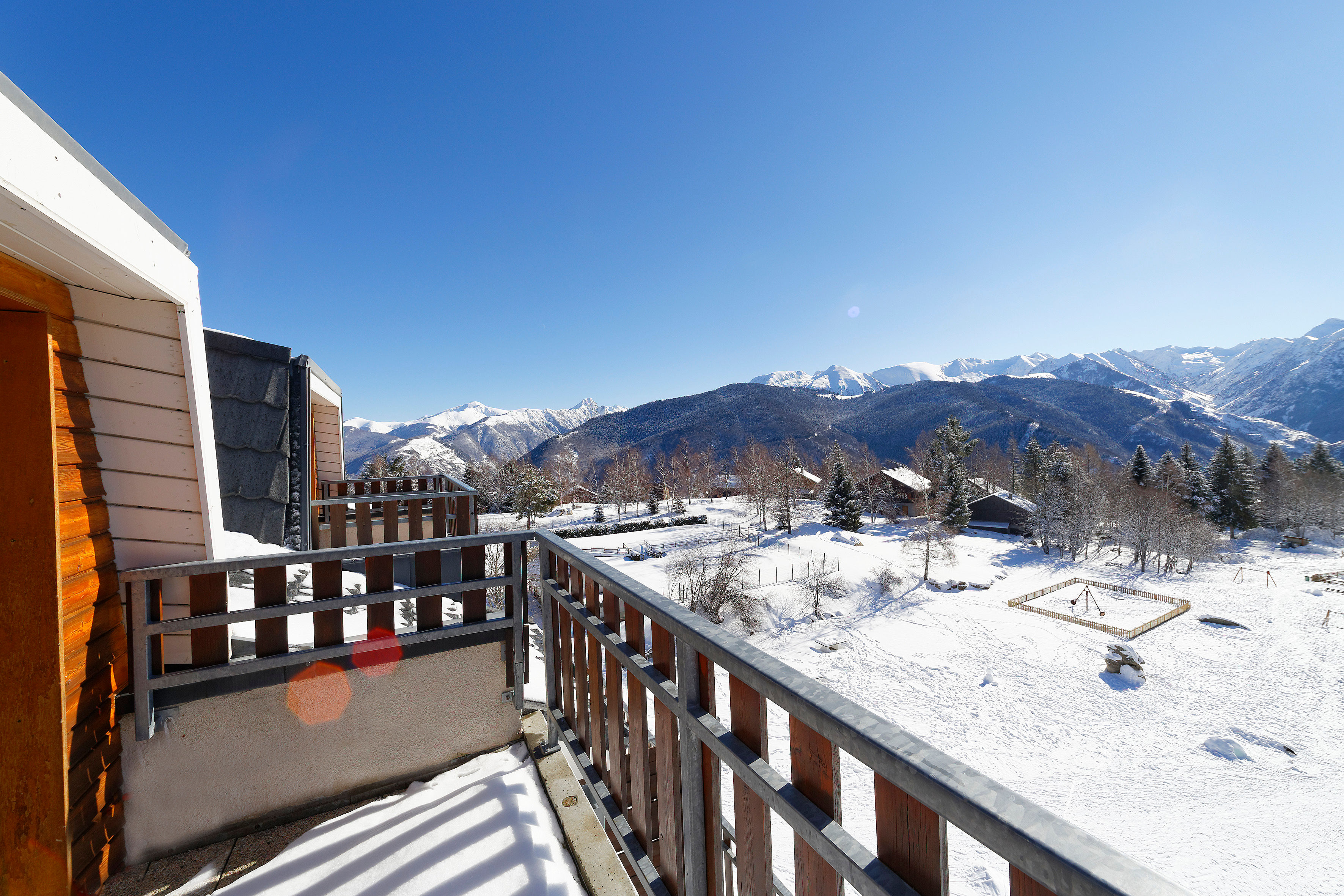 image Breathe in the fresh mountain air from your private balcony escape.