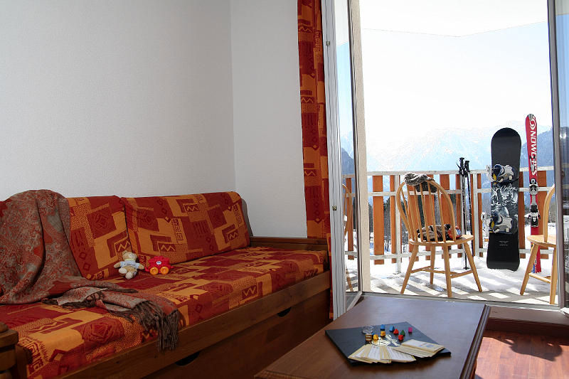 image Relax on the sofa after a day on the pistes, surrounded by mountain charm.