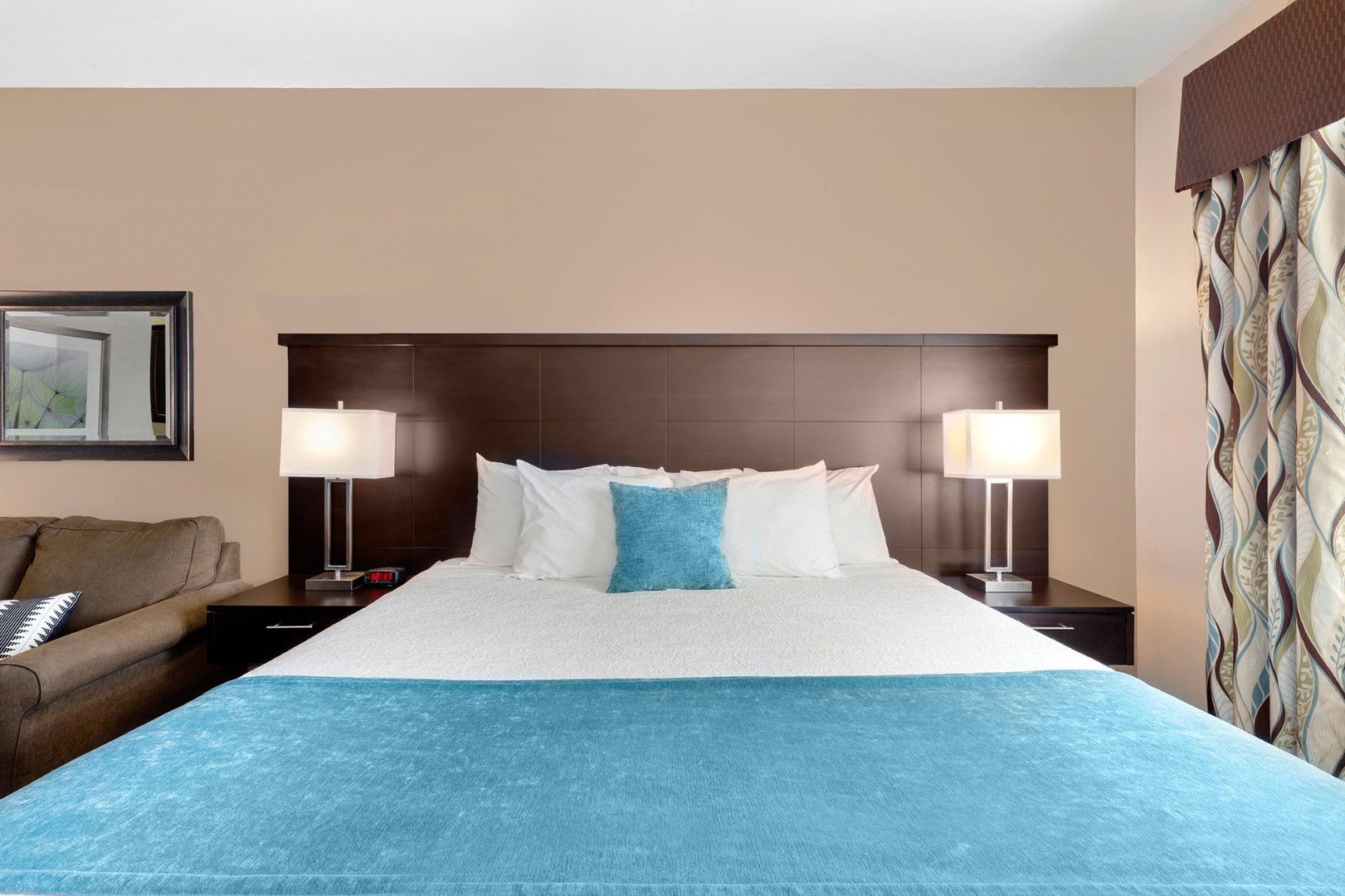 image King bed with accent pillows and lamps