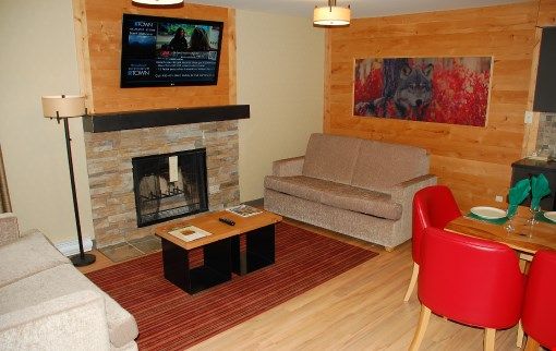 image Come and stay in our lovely 4 bedroom condo - you'll feel right at home in this lovely living room.