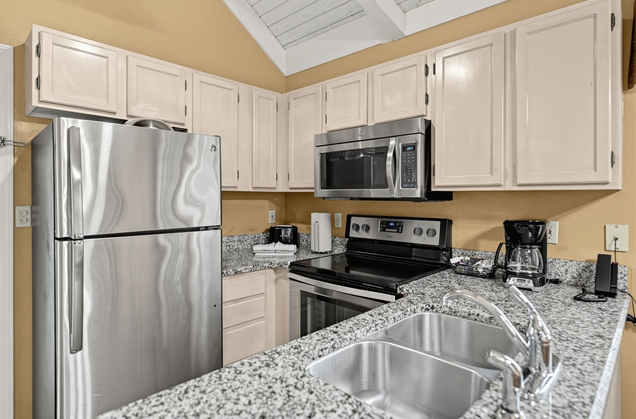 image Kitchen with stainless steel appliances and granite countertops