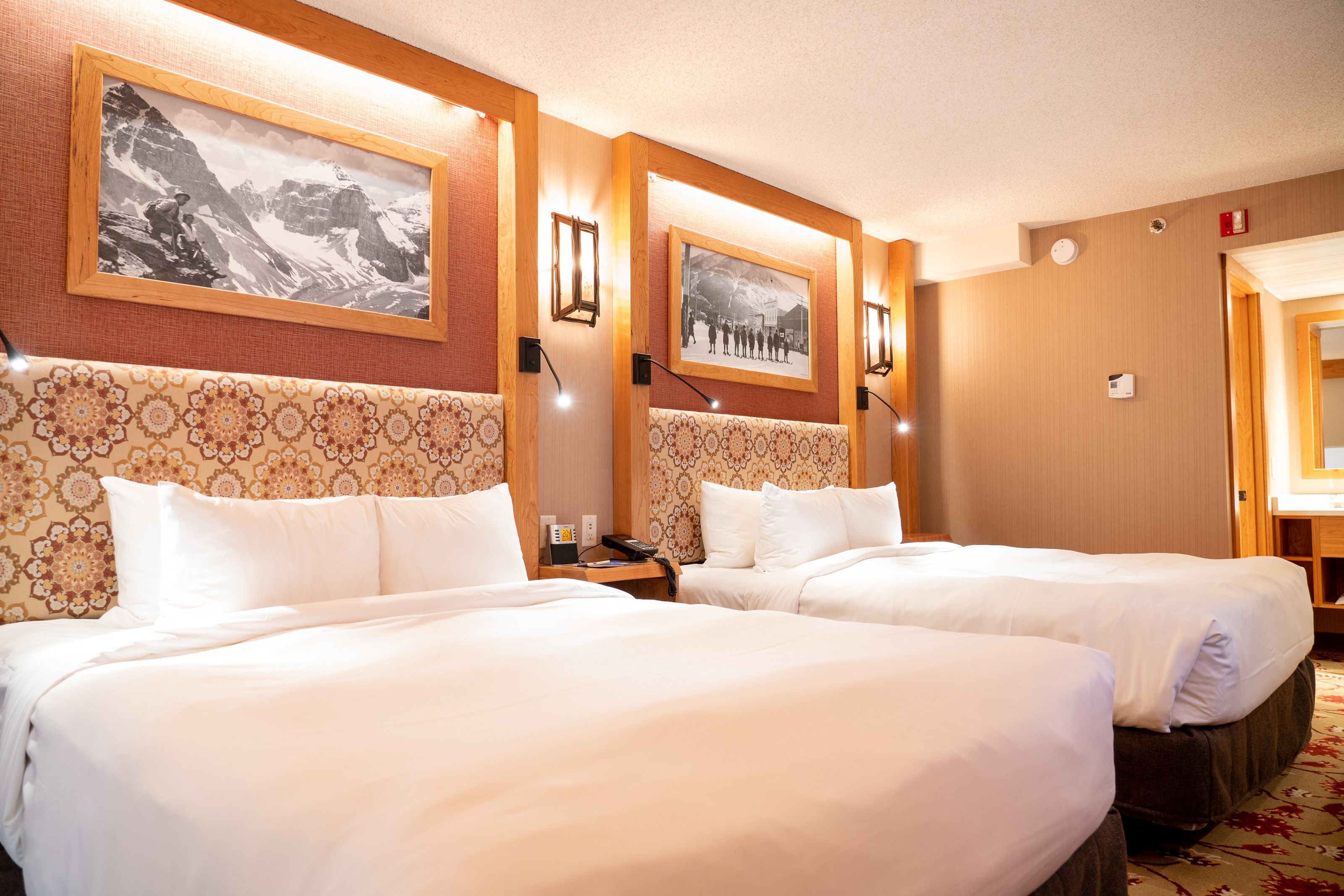 image Drift off to sleep in the plush queen beds, perfect for a vacation with close friends and family!