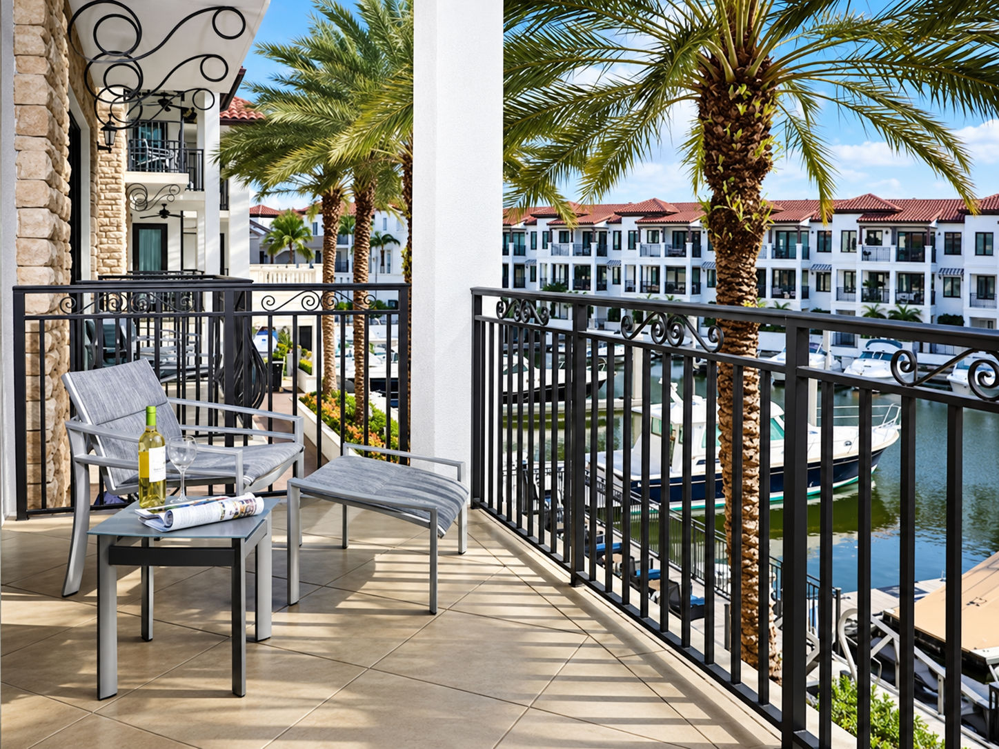 image Furnished balcony with seating and marina view