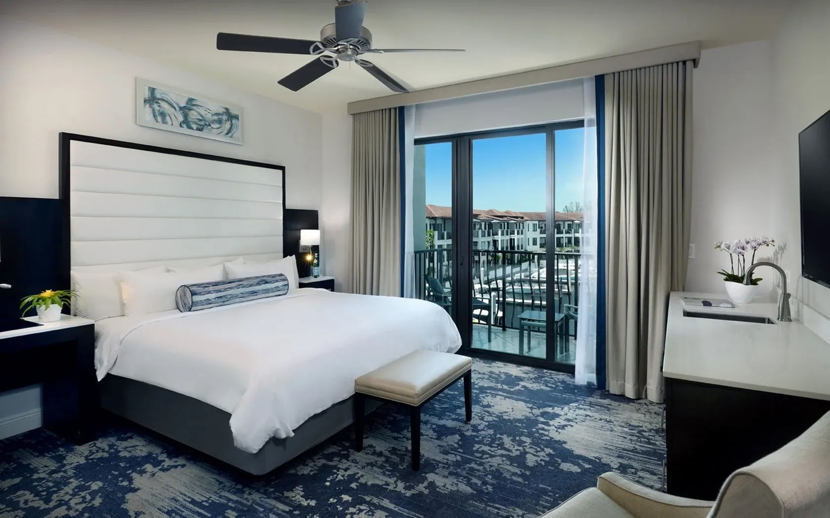 image Bedroom with king-size bed and ceiling fan