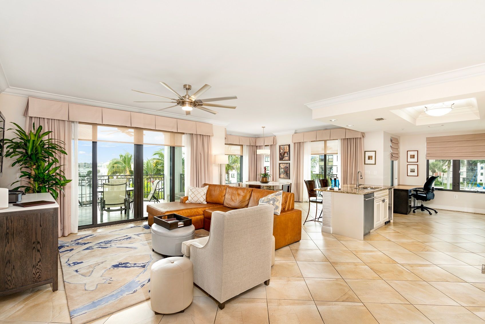 image The Great Room with ceiling fan, comfortable seating, dining area, tiled floor
