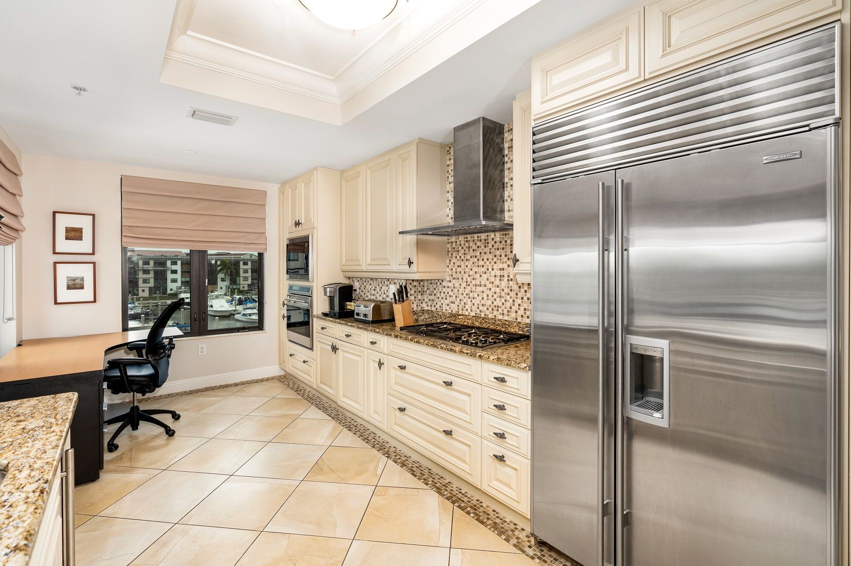 image Kitchen with stainless-steel appliances and granite countertops