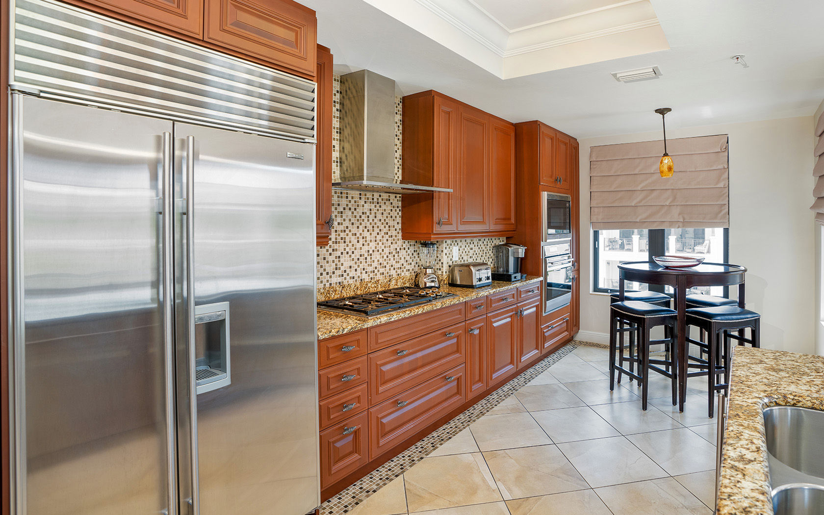 image Kitchen with stainless-steel appliances and granite countertops