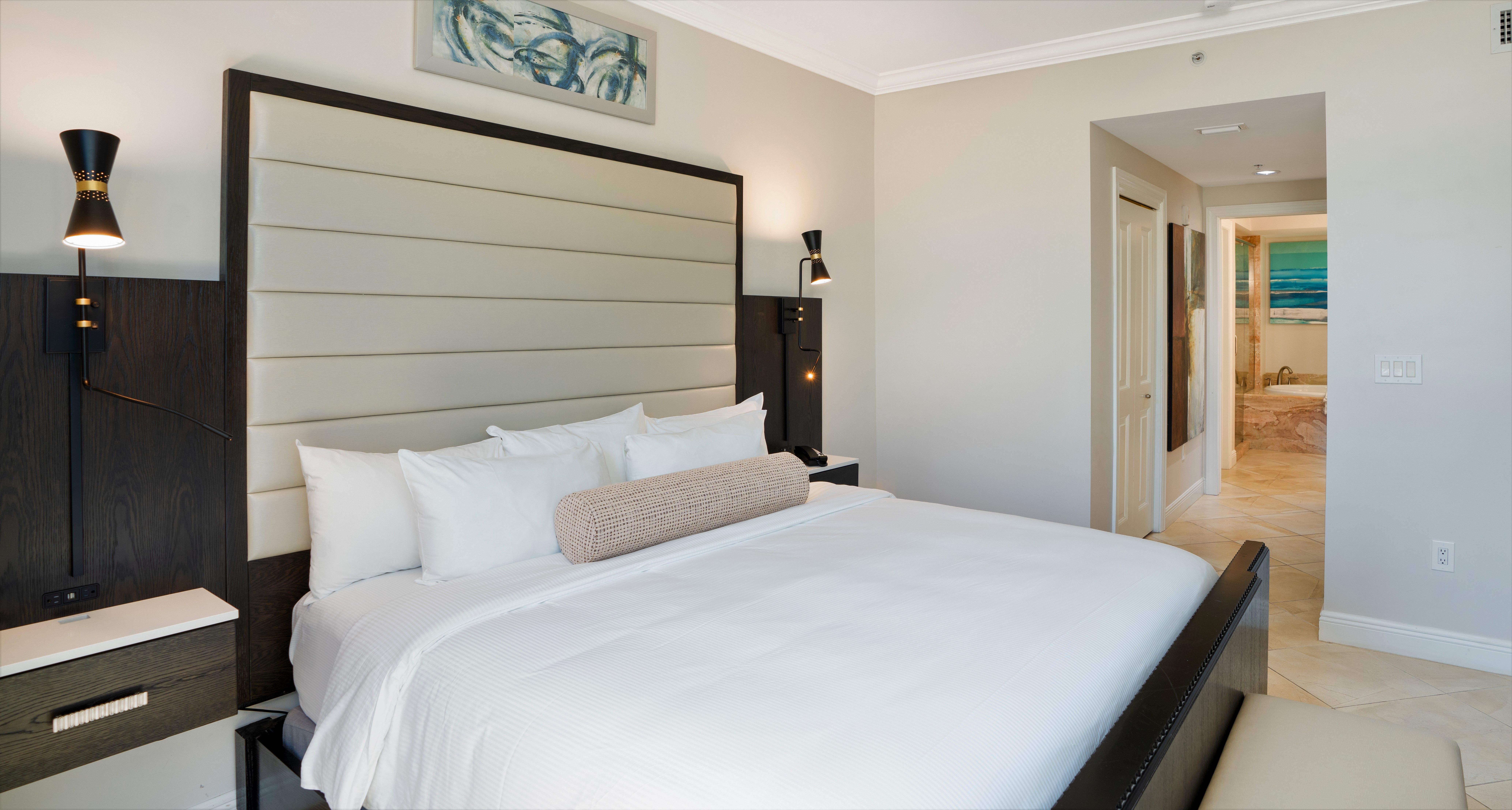 image Bedroom with king-size bed and decorative artwork